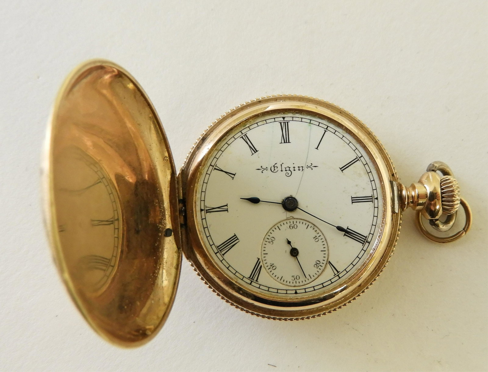Elgin 14K Gold Pocket Watch, circa 1900: Case marked DUBOIS W.C.O.C. 14K U.S. ASSAY 100202. Serial number 9736681 1.5" diam (STAT907)(EL)