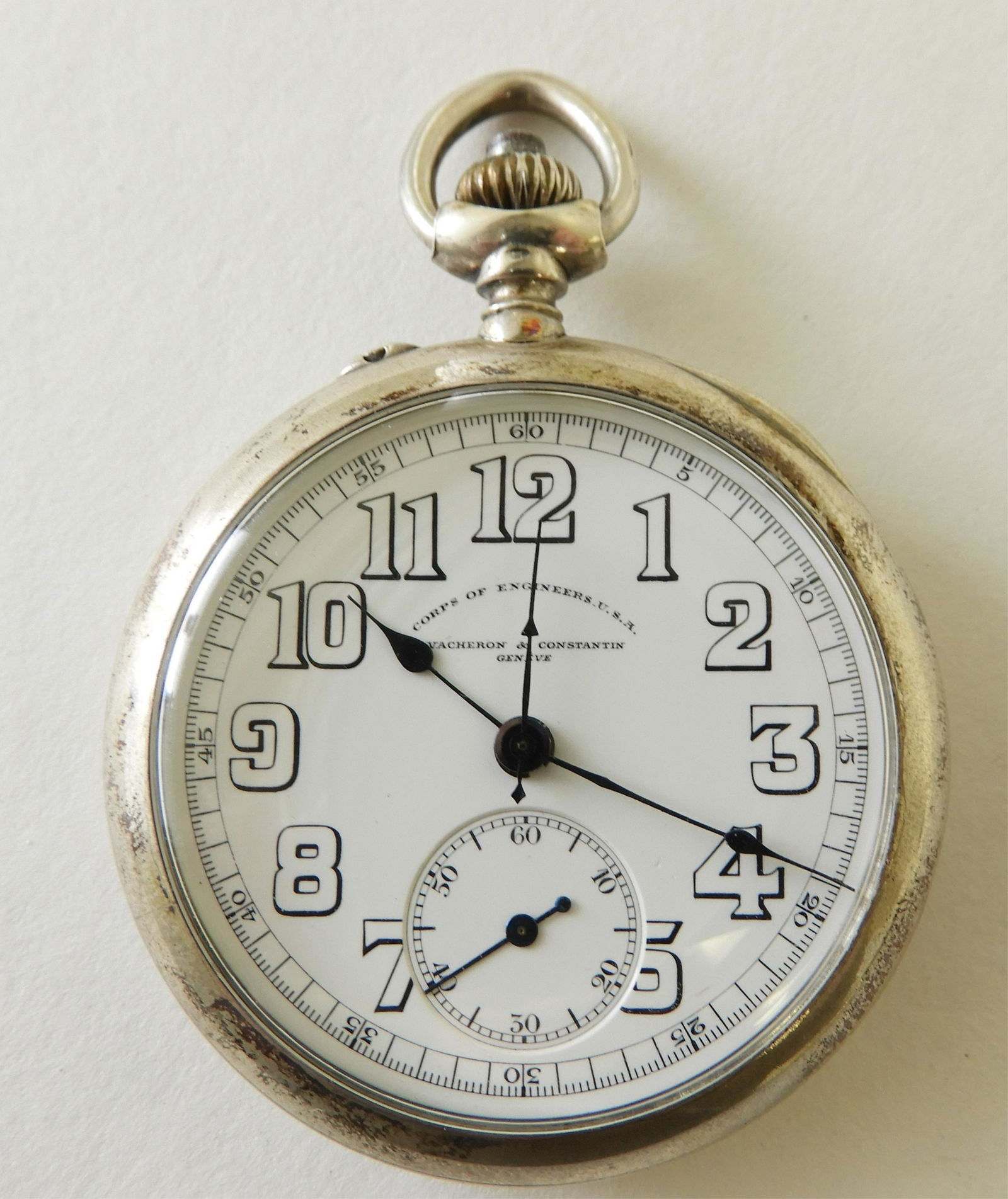 Vacheron & Constantin Silver Pocket Watch, c 1920: Open face polished silver case stamped “Corps of Engineers / U.S.A. / No. 2100”, circa 1920, pin/nail push, white enamel dial stamped “Corps of Engineers, U.S.A. / Vacheron & Constantin / Geneve