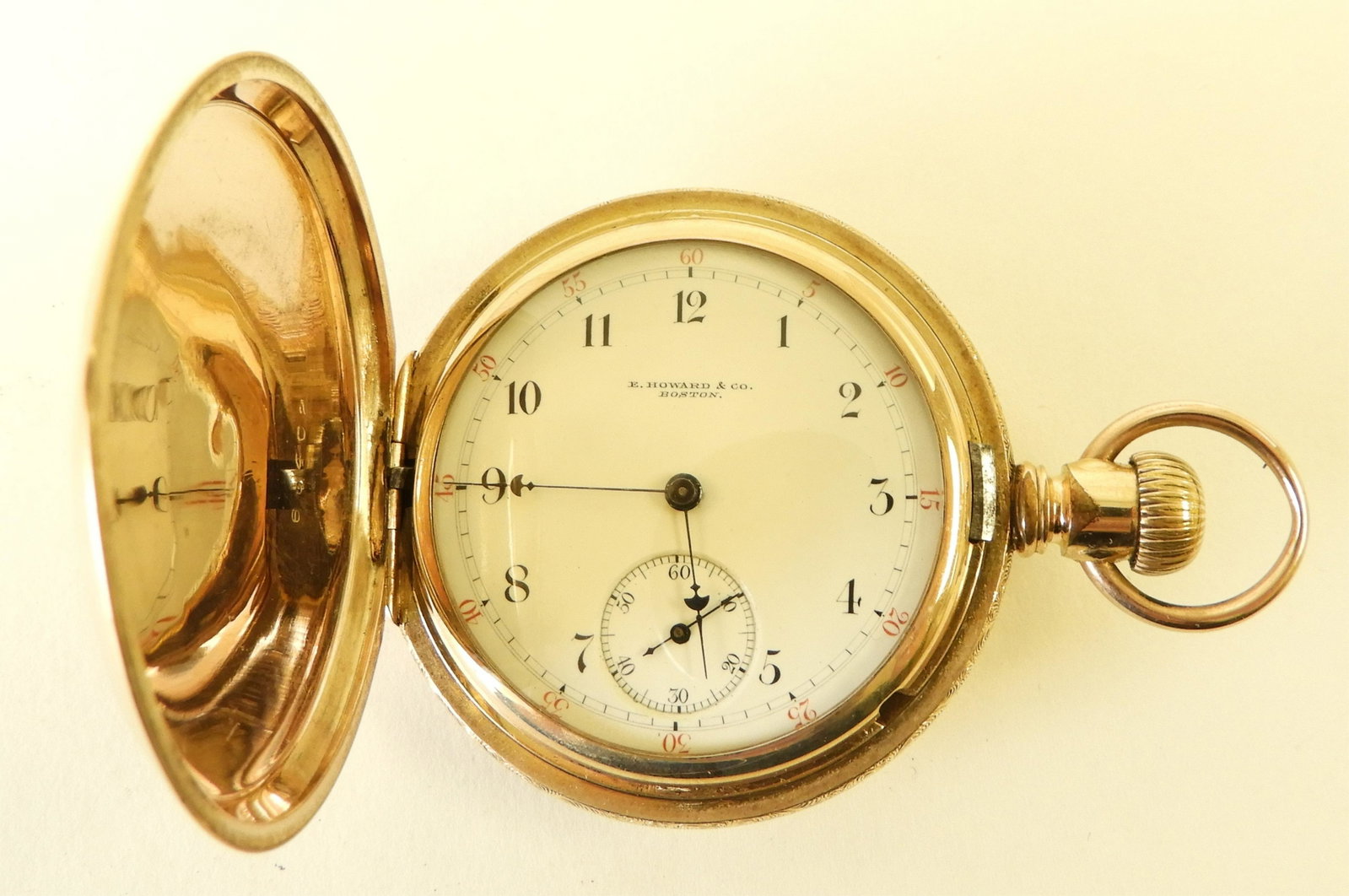 E. Howard & Co 14K and Diamond Pocket Watch: Flowers, arrows and cartouche 14k yellow, rose, white and green gold hunter case set with one (1) Old Mine cut diamond, white enamel dial stamped “E. Howard & Co. / Boston.”, black Arabic numerals