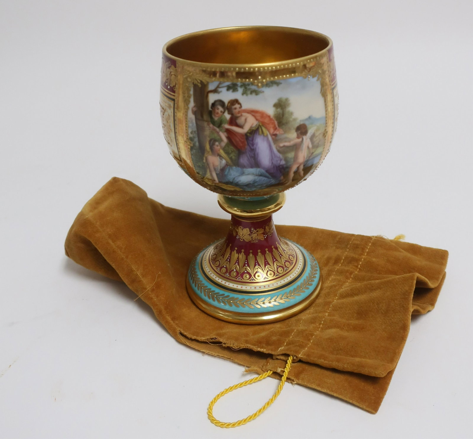 Dresden Painted Porcelain Chalice, Richard Wehsene: Richard Wehsener, Dresden hand painted porcelain chalice with multicolored ground and gilt decorations, scene of standing figures with putti 6 1/4"H x 4"W (JKOC9881)(MM)