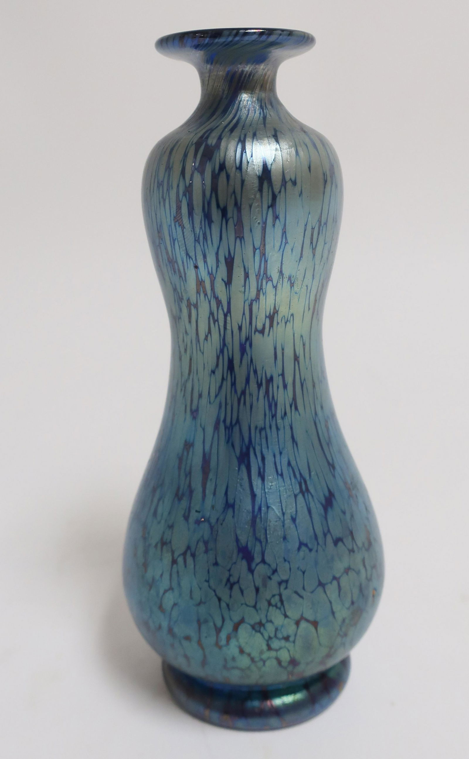 Possible Loetz Art Glass Vase: Possible Loetz Art Glass Vase, iridescent and footed 7" H x 3" Dia. (SFOX91029)(WT)