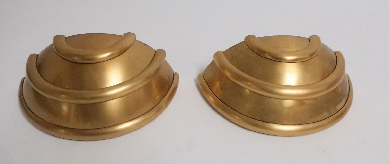 Pair French Art Deco Brass Wall Lights, c.1925: Pair French Art Deco Brass Wall Lights, circa 1925 stamped Made in France (2 pc.) 4" H x 10 1/2" W Property from the Estate of an Important New York Modernism Dealer. (NJWA127/2)(MS)