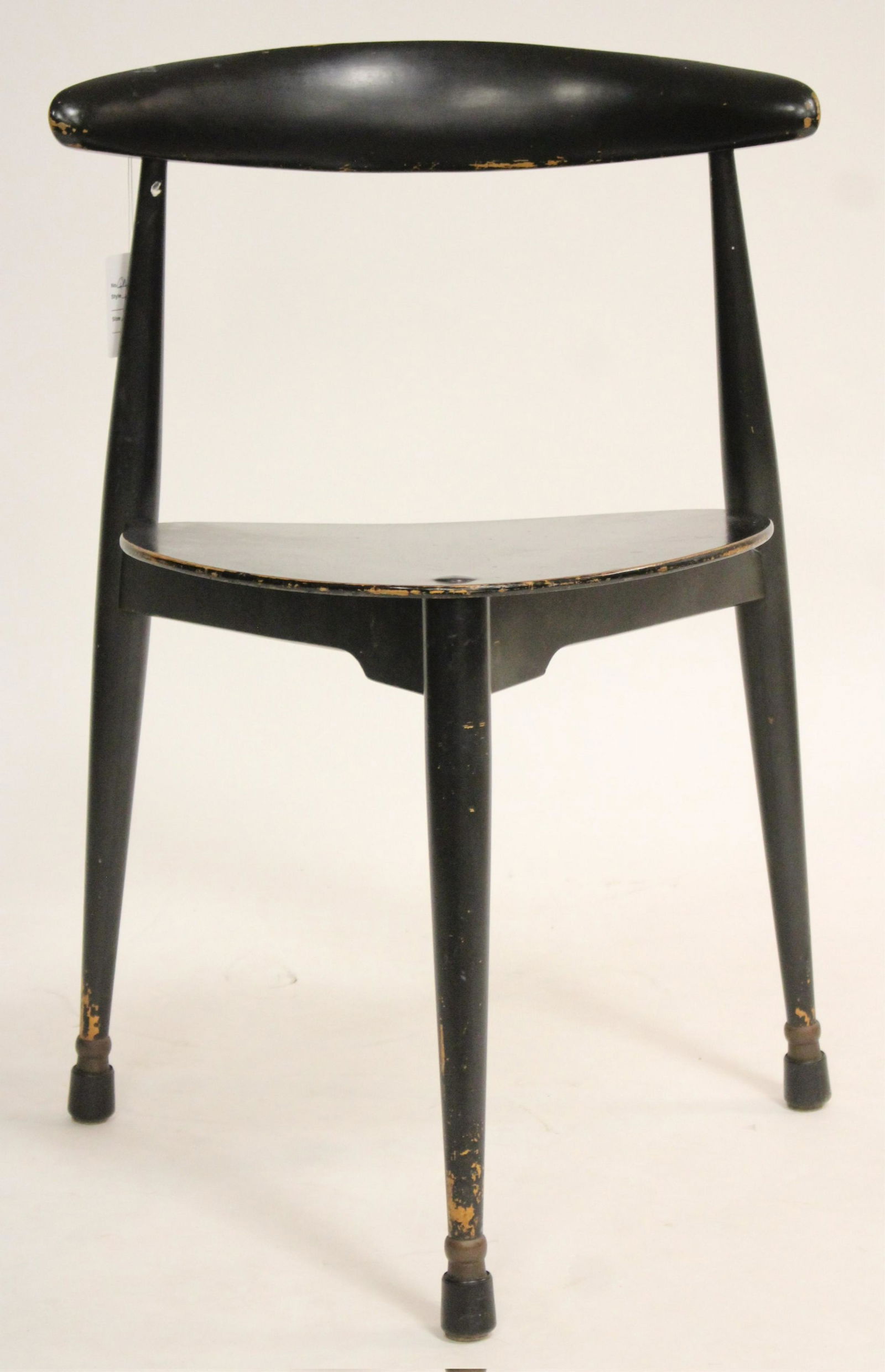 Hans Wegner Painted Molded Plywood Chair: Hans J. Wegner Wooden Chair, underside of base with crossed impressed marking, black stained finish, legs ended out with metal and molded plastic caps 31"H x 21"W x 19"D (QMOST945)(MM)