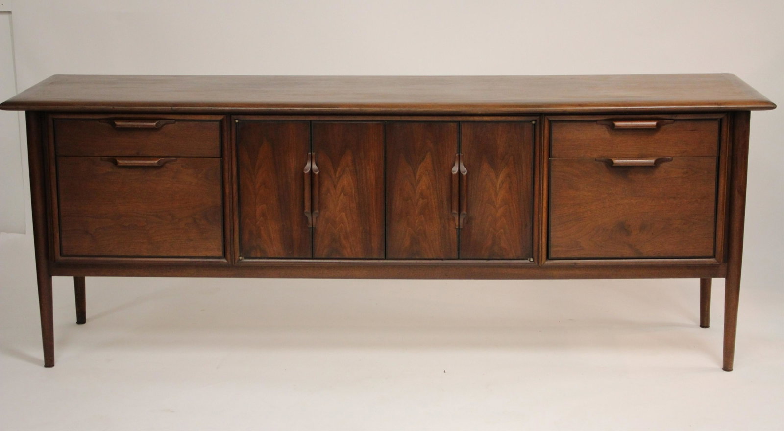 Mid century Modern Alma Castilian Credenza: Mid Century Modern Alma Castilian Credenza, 1977,Scandinavian style with tapered exoskeleton legs, back side is finished design [2] 28 1/2 x 78 x 21 1/2 (MORT9620)(MM)