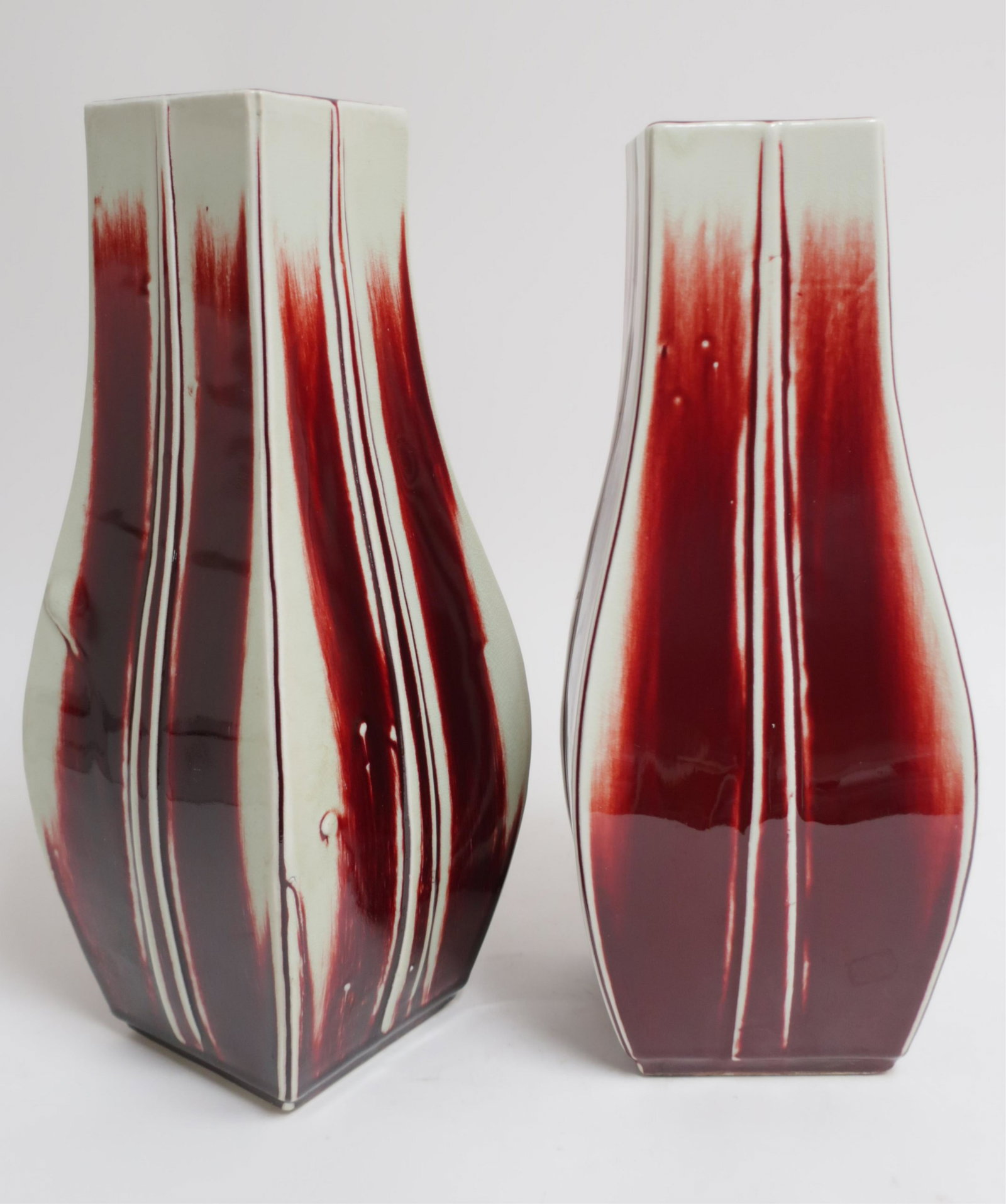 Pair of Chinese Porcelain Sang de Bouf Vases: Dimensions: 17 H x 7 square