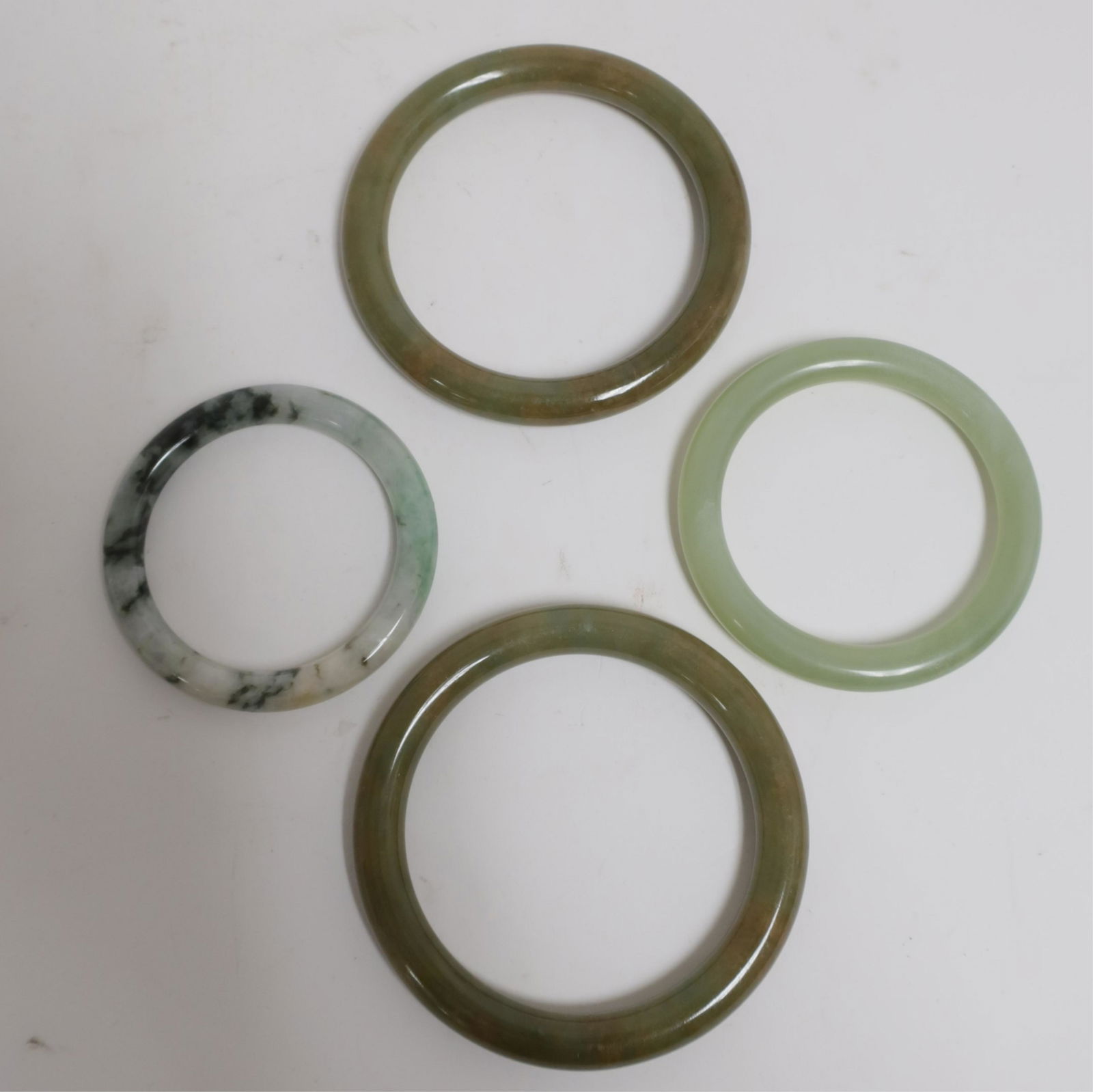 Three Chinese Jade & One Serpentine Bangles (1 of 2)