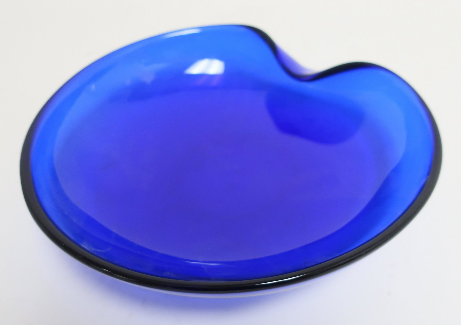 Elsa Peretti For Tiffany & Co. Cobalt Glass Bowl: Elsa Peretti For Tiffany & Co. Cobalt Blue Glass Bowl, etched "Elsa Peretti for Tiffany" Dimensions: 2.75" H x 10.25" Dia. ()()