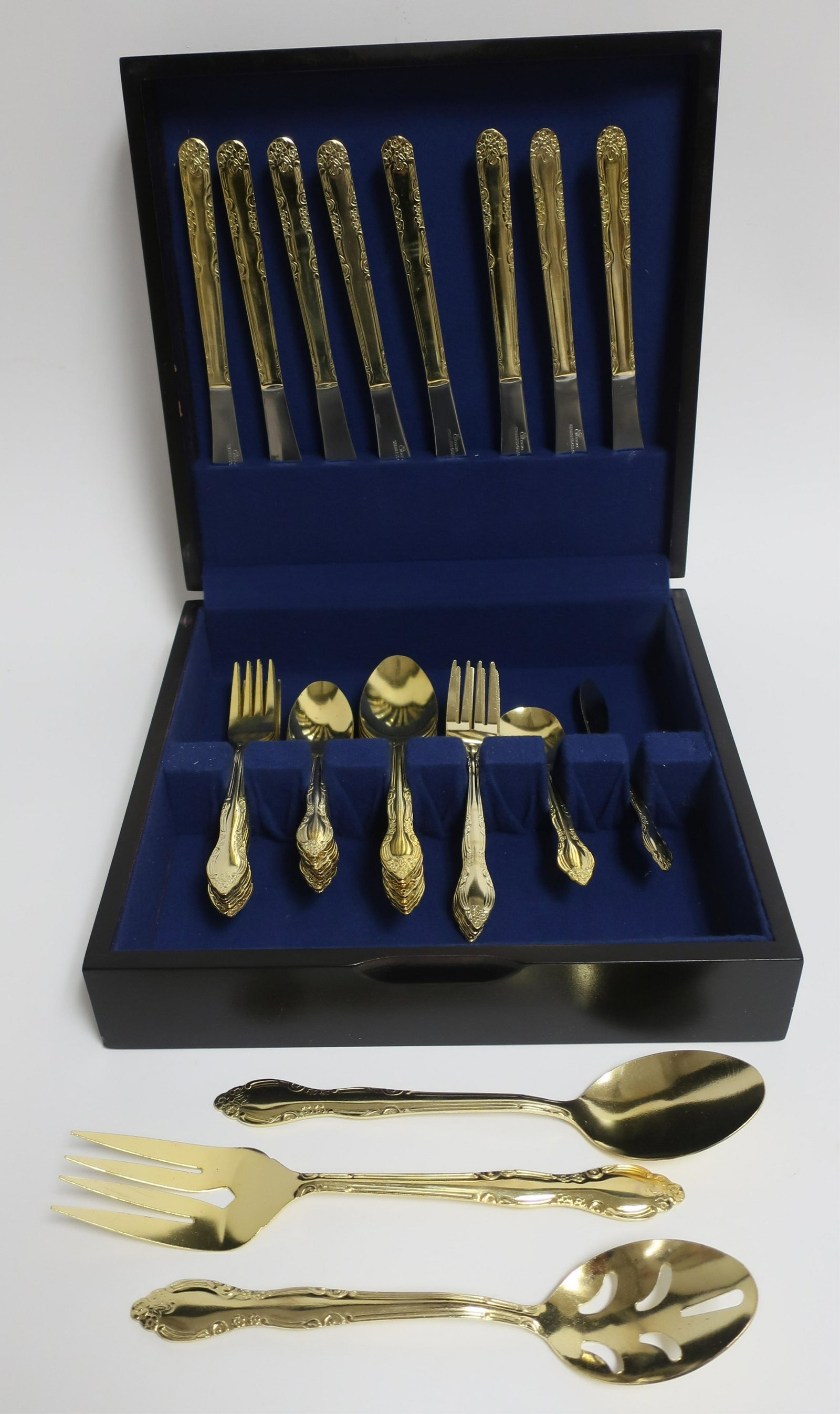 Gibson Flatware Service for 8: Gibson Flatware Service for 8, lightweight stainless with gilt finish, boxed (lot) Dimensions: Dinner fork 7" L (QDIP1256/lot)(WT)