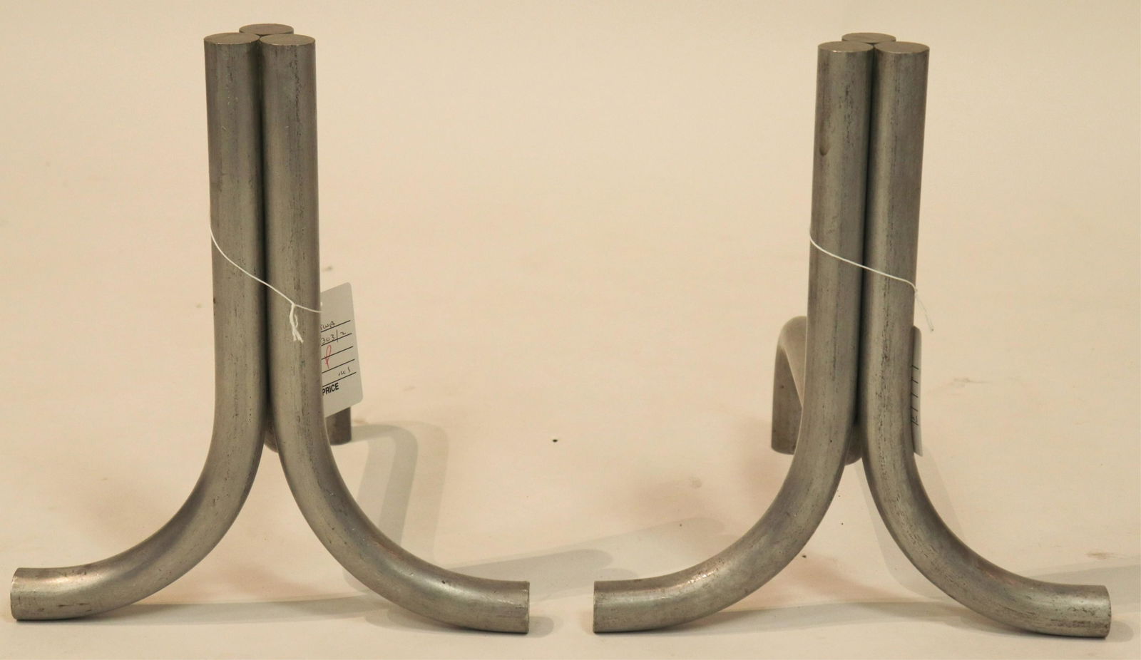 Pair Art Deco Aluminum Andirons, circa 1930: Pair Art Deco Aluminum Andirons, circa 1930 (2 pc.) (NJWA303/2)(MS) Dimensions: 13" H Property from the Estate of an Important New York Modernism Dealer.