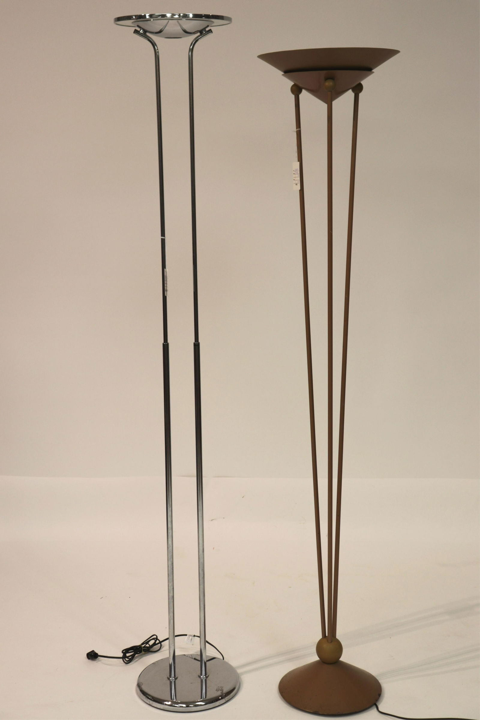 2 Floor Lamps, a Kovacs & Estil "Saturn": 2 Floor Lamps, a Kovacs gold/yellow painted metal midcentury with 3 supports and a Estil chrome "Saturn" (2 pc.) (QDRIC2849/2)(WT) Dimensions: 69" H and 73" H