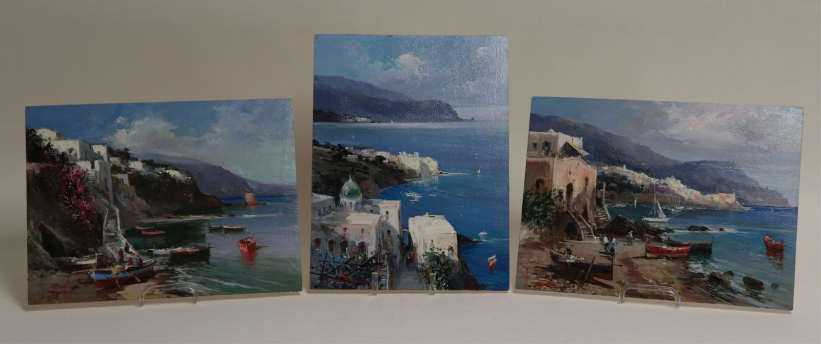 Claudio Simonetti - 3 Sea Scenes: Claudio Simonetti, 20th C.,3 Sea scenes, titled By the Sea, Beached Boats At Dawn, Steps to the Sail,O/B (HEAR2386/3)(MM) Dimensions: 12 1/4x 16 1/4