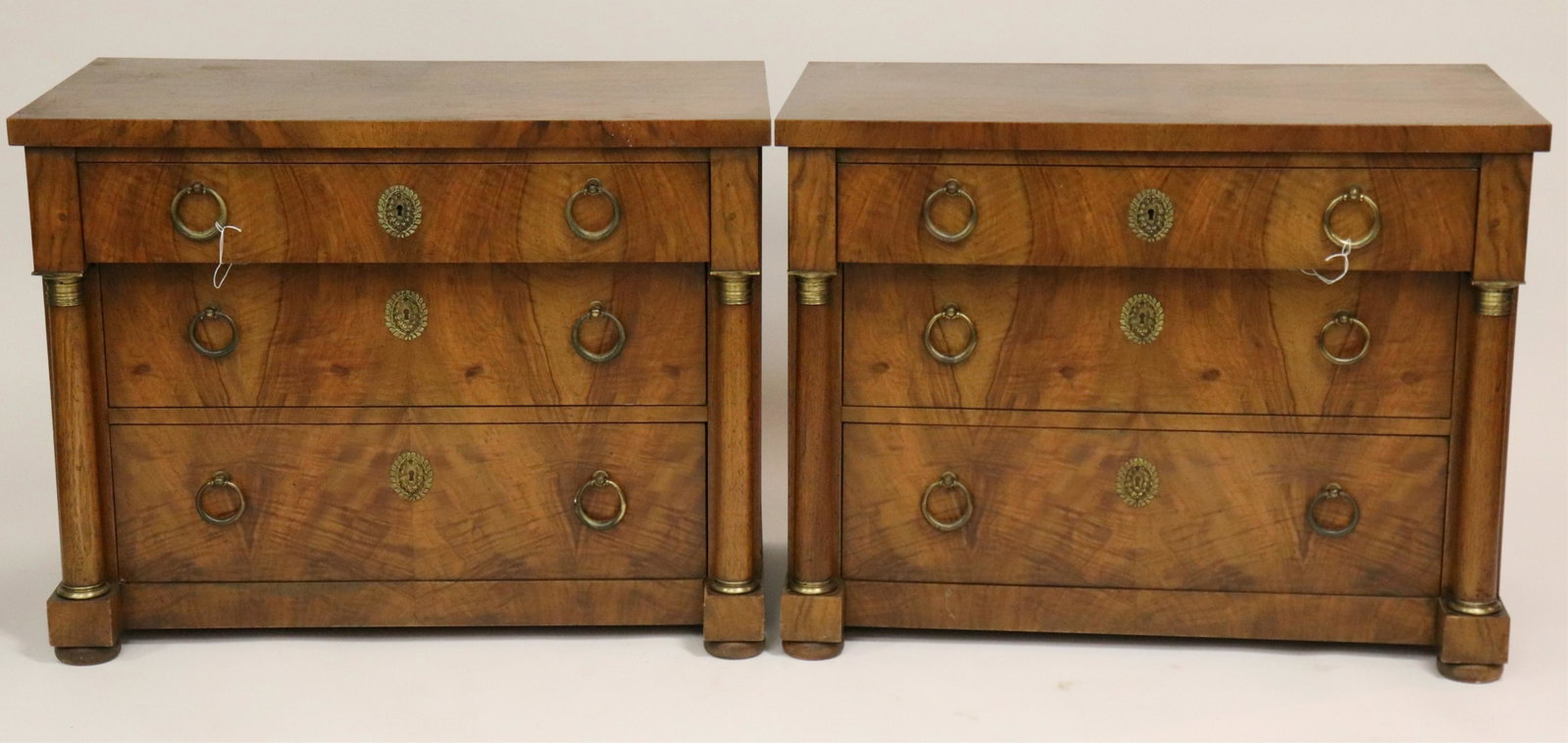 Pair of Empire Style Commodes by Baker: Gilt metal mounted walnut (XWEA1146/2)(MS) Dimensions: 25.5 H x 33.5 W x 19.25 D