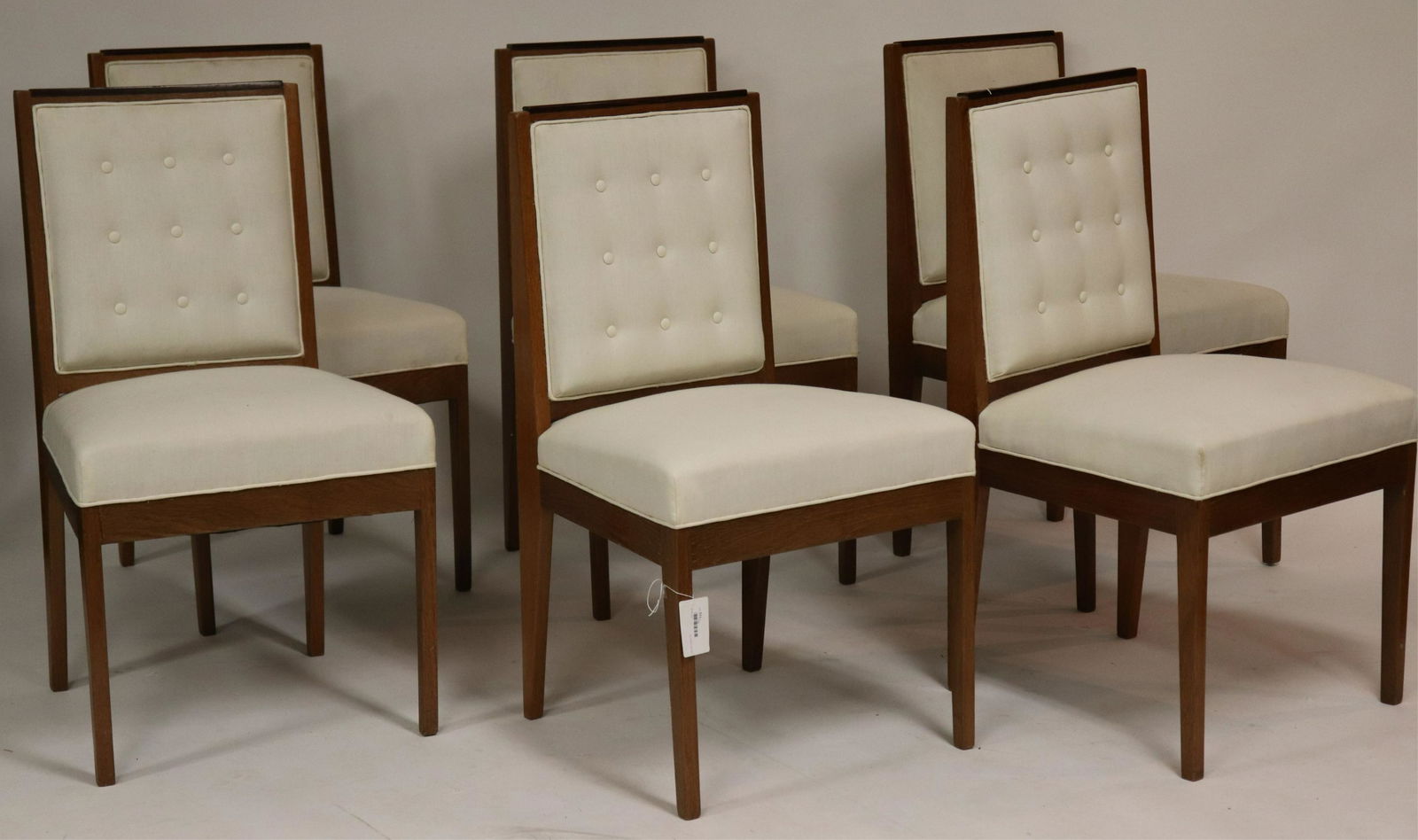 Set of Late Art Deco Oak & Mahogany Dining Chairs: Set of Late Art Deco Oak and Mahogany Dining Chairs, circa 1940, upholstered in white buttoned muslin (6 pc.) (NJWA331/6)(MS) Dimensions: 34 3/4" H x 18 1/4" W x 19 1/2" D Property from the Estate of