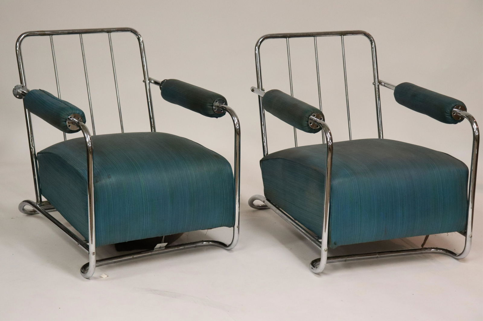 Pair Art Deco Chrome Arm Chairs, circa 1930: Pair Art Deco Chrome Arm Chairs, circa 1930, in the style of KEM Weber (2 pc.) (NJWA272/2)(MS) Dimensions: 33 1/2" H x 25" W x 32" D Property from the Estate of an Important New York Modernism Dealer.