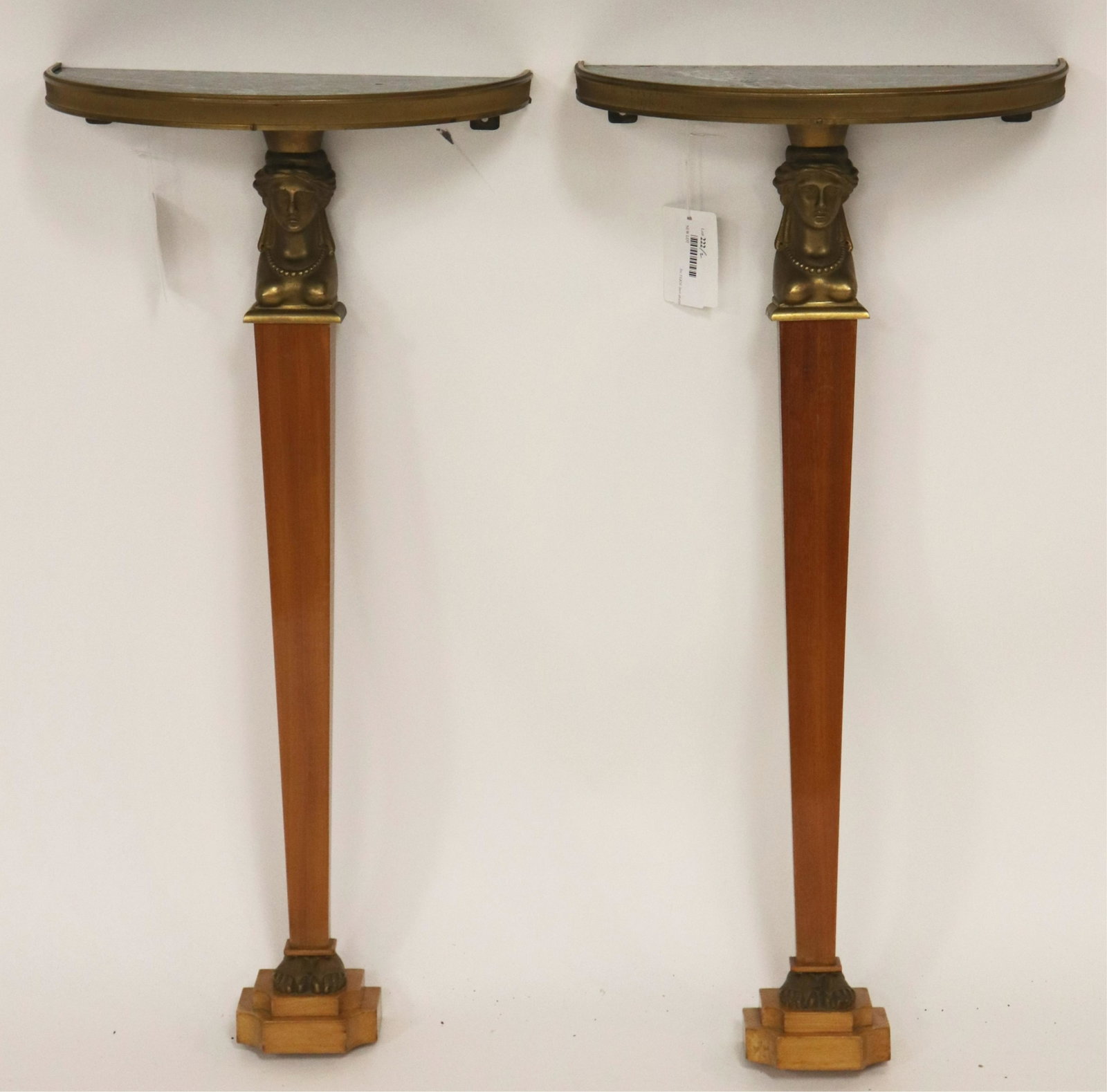 Pair Empire Style Ormolu and Satinwood Consoles: Pair Empire Style Ormolu and Satinwood Consoles, circa 1935, inset verde antigua marble tops, with caryatids (2 pc.) (NJWA222/2)(MS) Dimensions: 28 3/4" H x 13 3/4" W x 8" D Property from the Estate o