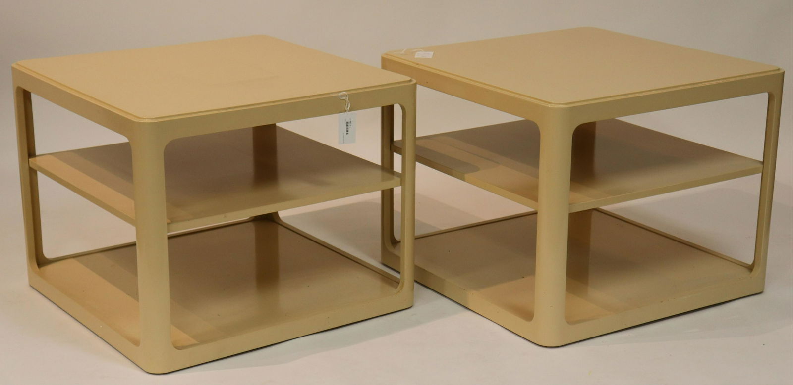 Pair of Karl Springer Style End Tables: Cream colored lacquer, circa 1980 (DDBR564/2)(MS) Dimensions: 23 H x 29 sq