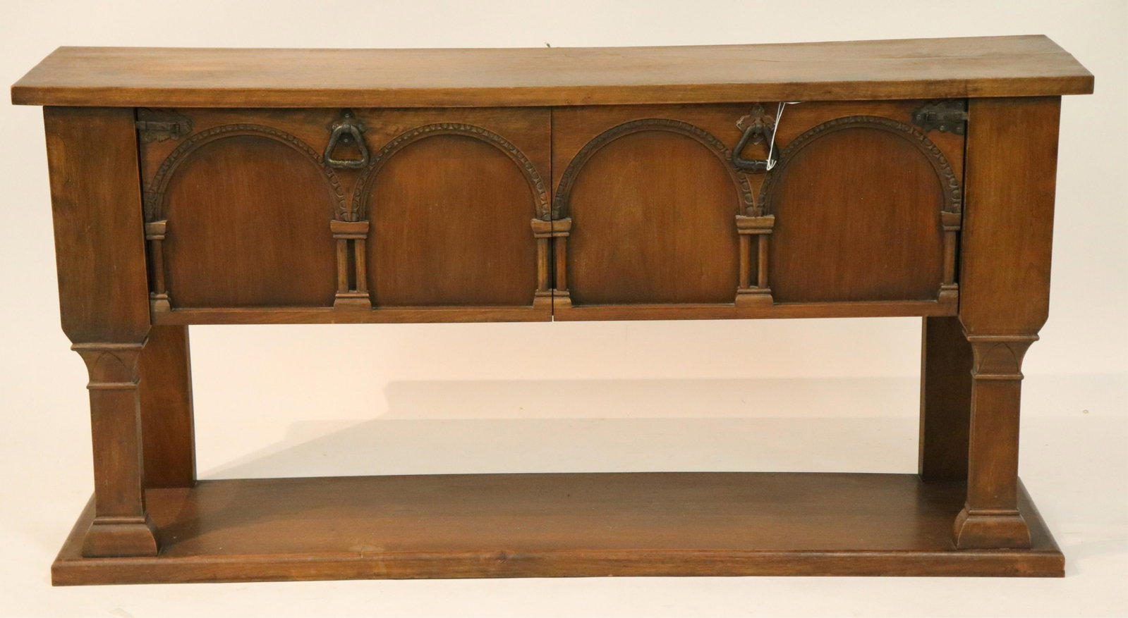 Fundacion G. Franco Cabinet Console: "Made In Spain" (Madrid,Spain) stamped into top edge wood back along with a small metal manufacturing plate. Walnut, iron hardware, two drop-down front cabinets column-supported to lower shelf, full b