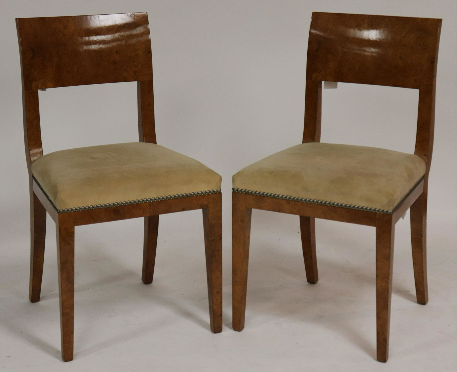 Pair Samuel Marx for Quigley Burlwood Side Chairs: Pair of Samuel Marx for Quigley Burlwood Side Chairs, each stamped Quigley, upholstered in tan suede (2 pc.) (NJWA283/2)(MS) Dimensions: 33 1/2" H x 17 3/4" W x 18" D Property from the Estate of an Im