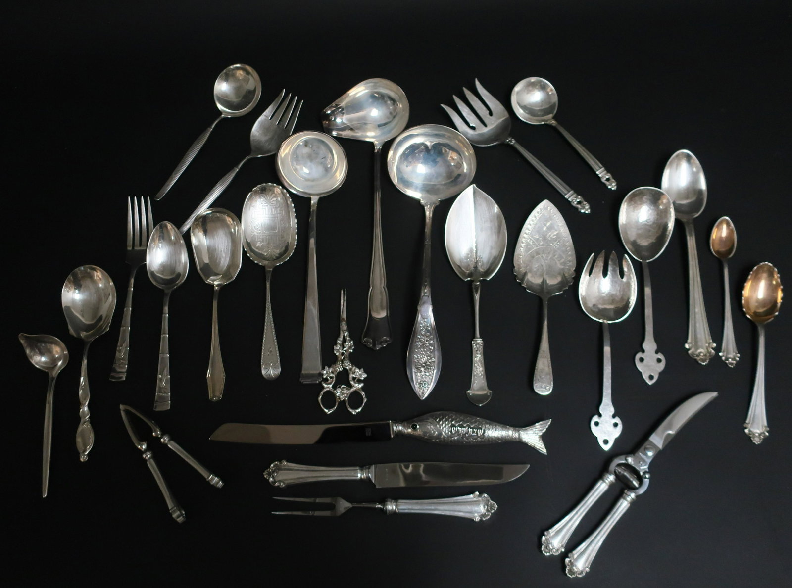 24 Silver Flatware Serving Pieces: 24 Silver Flatware Serving Pieces, mostly sterling with 2 coin and 1 .800 ladle ,65 ozt weighable silver (25 pc.) (DRIC2013/25)(WT) Dimensions: Longest 14 1/2", shortest 6" L