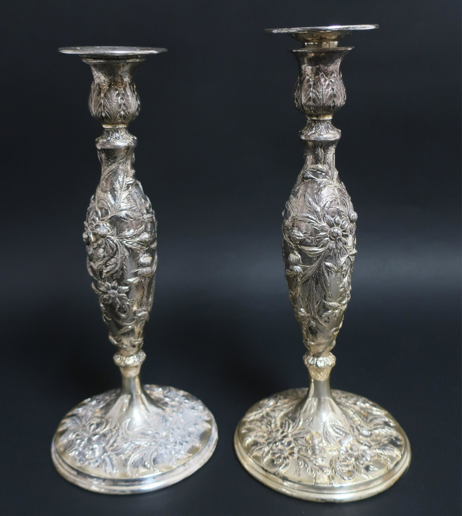Pair of Samuel Kirk Sterling Floral Candlesticks: Samuel Kirk & Son Baltimore, Pair Sterling Silver hand repoussed floral candlesticks with original matched sterling bobeches, late 19th C., all pieces marked including #108, weighted, gross troy ounce