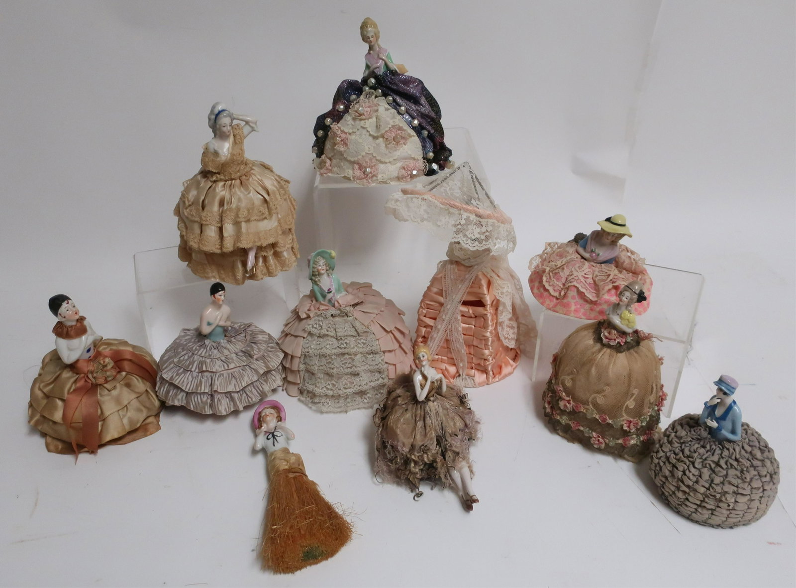 11 Porcelain & Fabric Pin Cushion Dolls: 11 Porcelain & Fabric Pin Cushion Dolls (11 pc.) Dimensions: 3 1/2" H to 10" H (DORI3139/11)(WT)