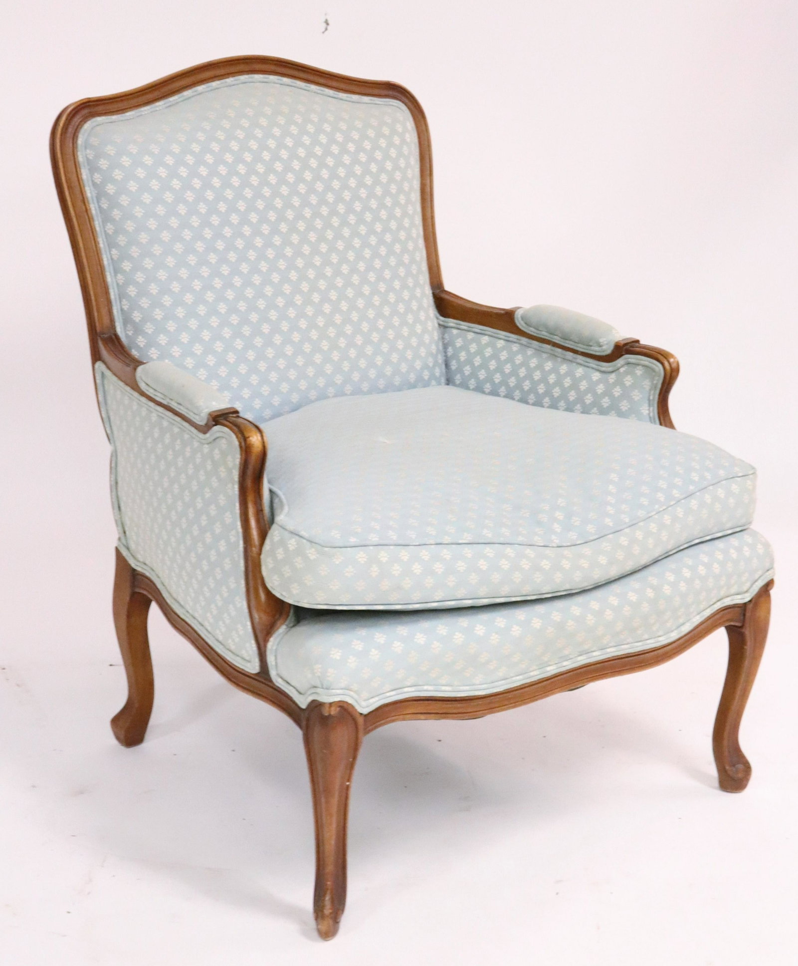 Louis XV Style Cherry Bergere: Louis XV Style Cherry Bergere, upholstered in light blue cotton brocade Dimensions: 35" H x 26 1/2" W x 30" D (ELB501)(MS)