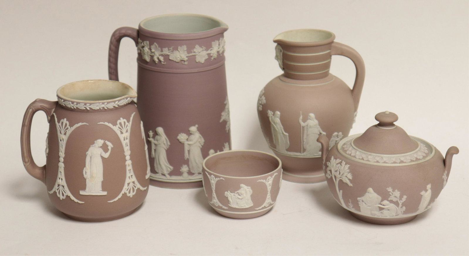 5 Wedgwood Lavender Jasper Dip Pitchers, Bowls: Wedgwood Lavender Jasper Dip, 3 pitchers/jugs & 2 bowls, 2 bowls and jug with satyr mask, impressed marks & England, 2 pitchers with impressed marks (5 pc.) Part II from a major collection of Wedgwood