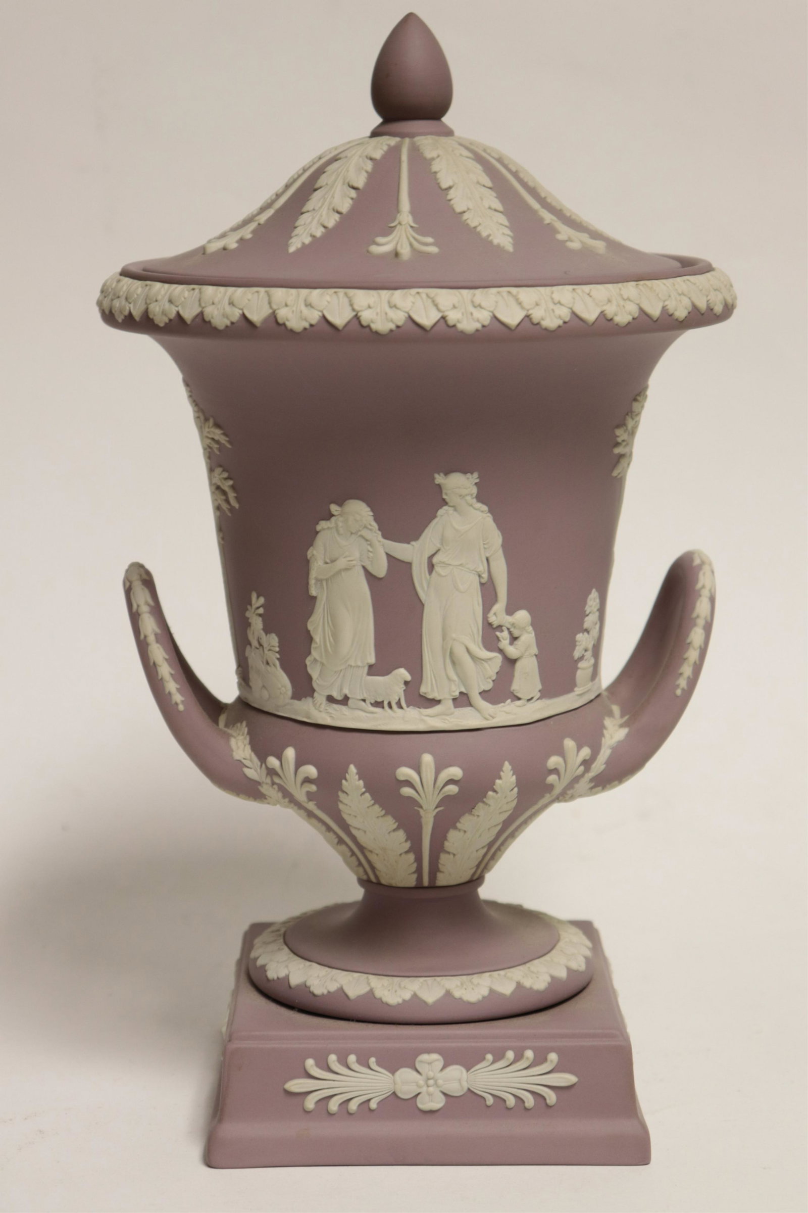 Wedgwood Lavender Jasperware Campagna Urn: Wedgwood Lavender Jasperware Campagna Shaped Covered Urn, 2 handles, female figures applied in white, impressed mark & Made in England, in 2 parts Part II from a major collection of Wedgwood, Long Isl