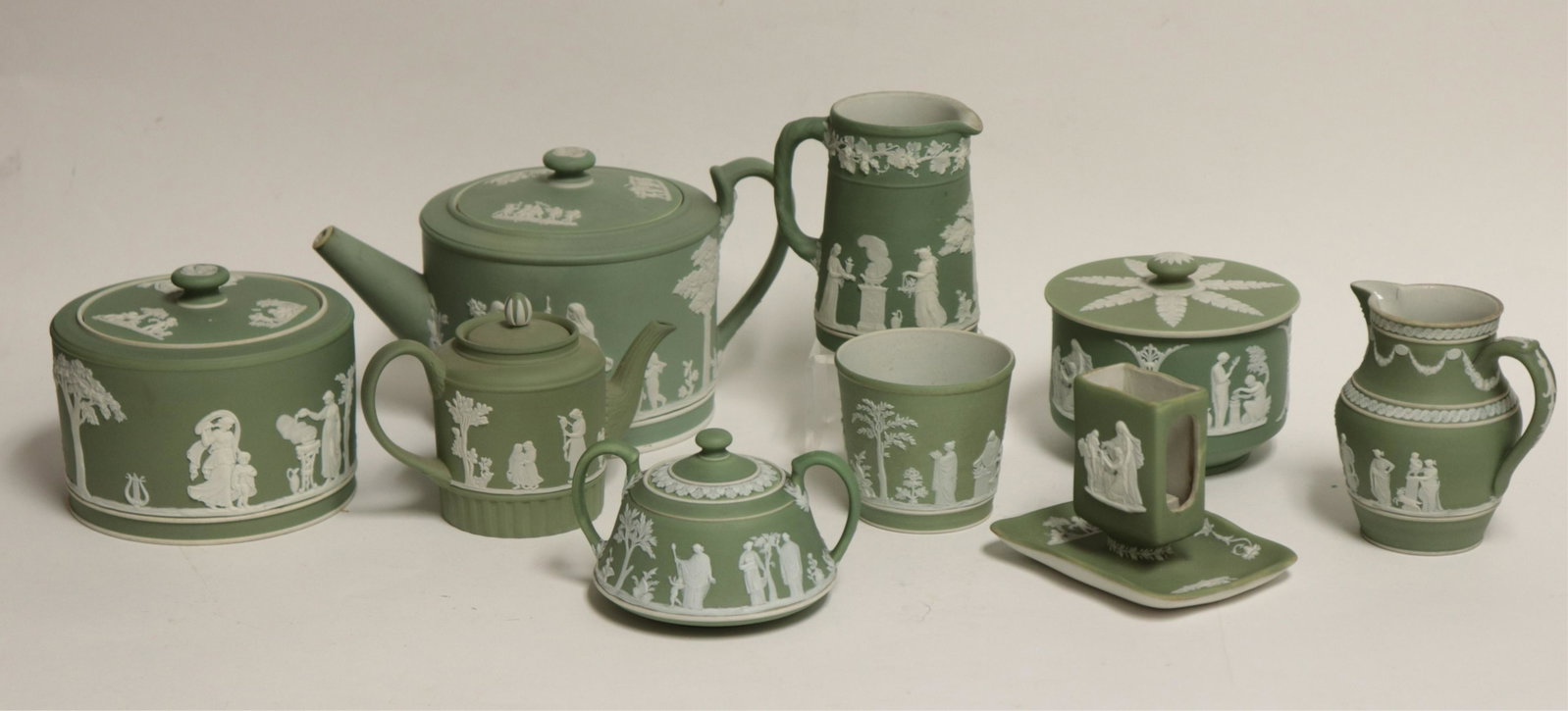 9 Wedgwood Green Jasper Dip Tea Wares: 9 Wedgwood Green Jasper Dip Tea Wares, larger pot with impressed mark, smaller with impressed mark & Made in England, all others with impressed marks & England (9 pc.) Part II from a major collection 