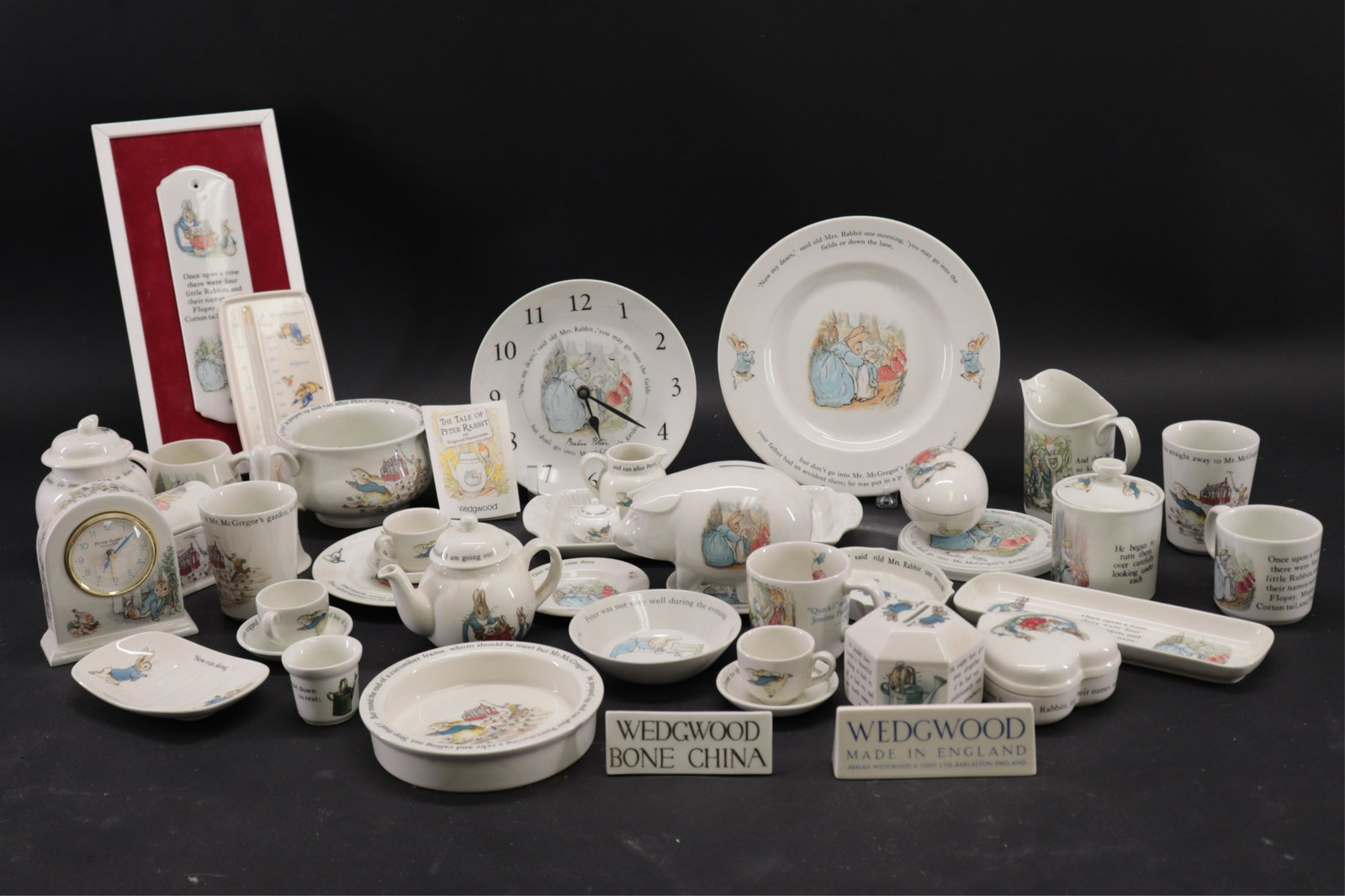 Collection of Beatrix Potter China by Wedgwood: Collection of Beatrix Potter China by Wedgwood Dimensions: Pig Piggybank 4 1/2" H x 6 1/2" L (ZWED5153/lot)(WT)
