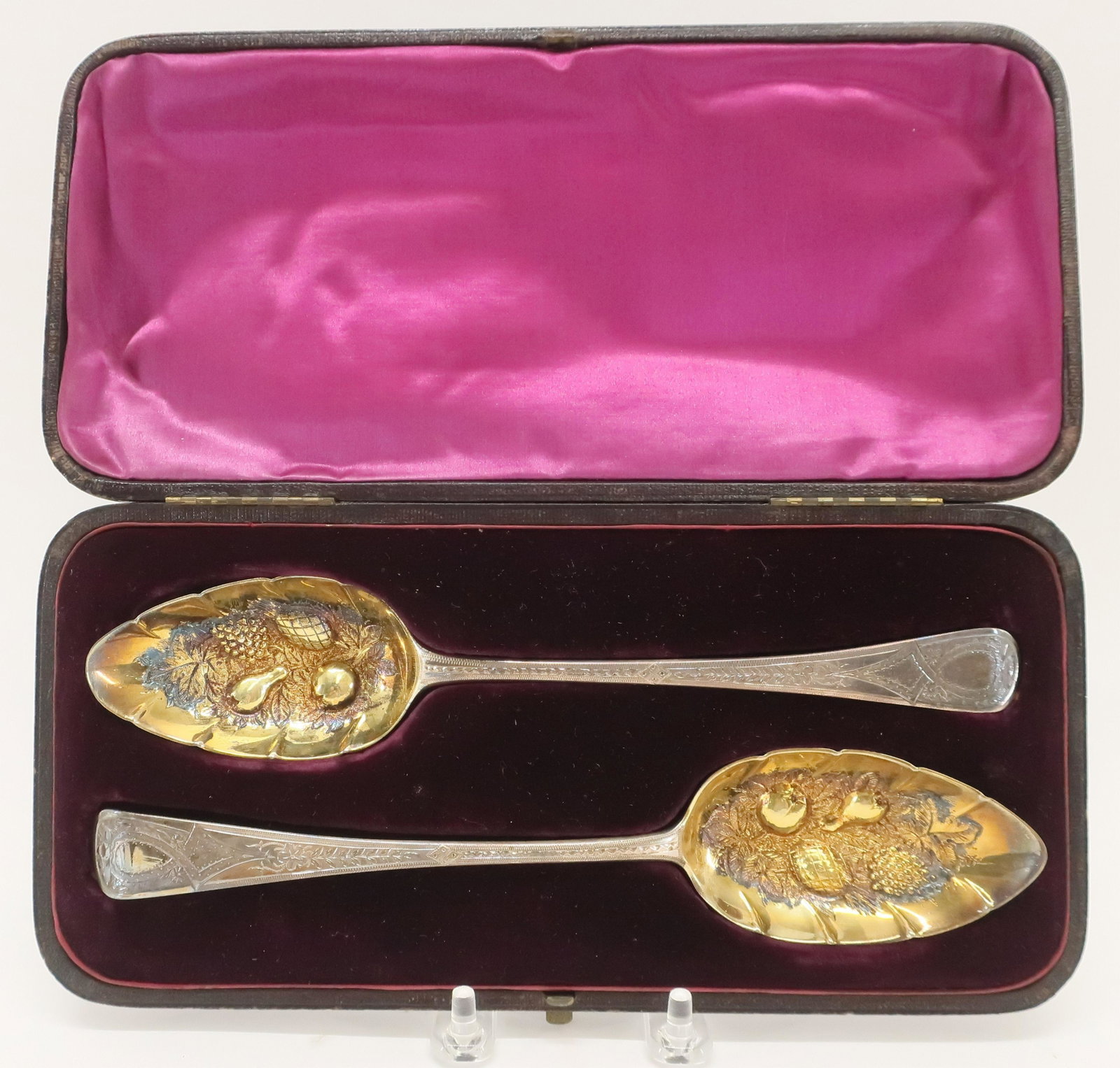 Near Pair George III Sterling & Gilt Berry: A Near Pair of George III Sterling Berry Spoon Gilt Bowls, Heavily Repoussed Gilt Bowl Berry Spoons, one by Alice and George Burrows, London, 1806, the second, slightly smaller and in an almost identi