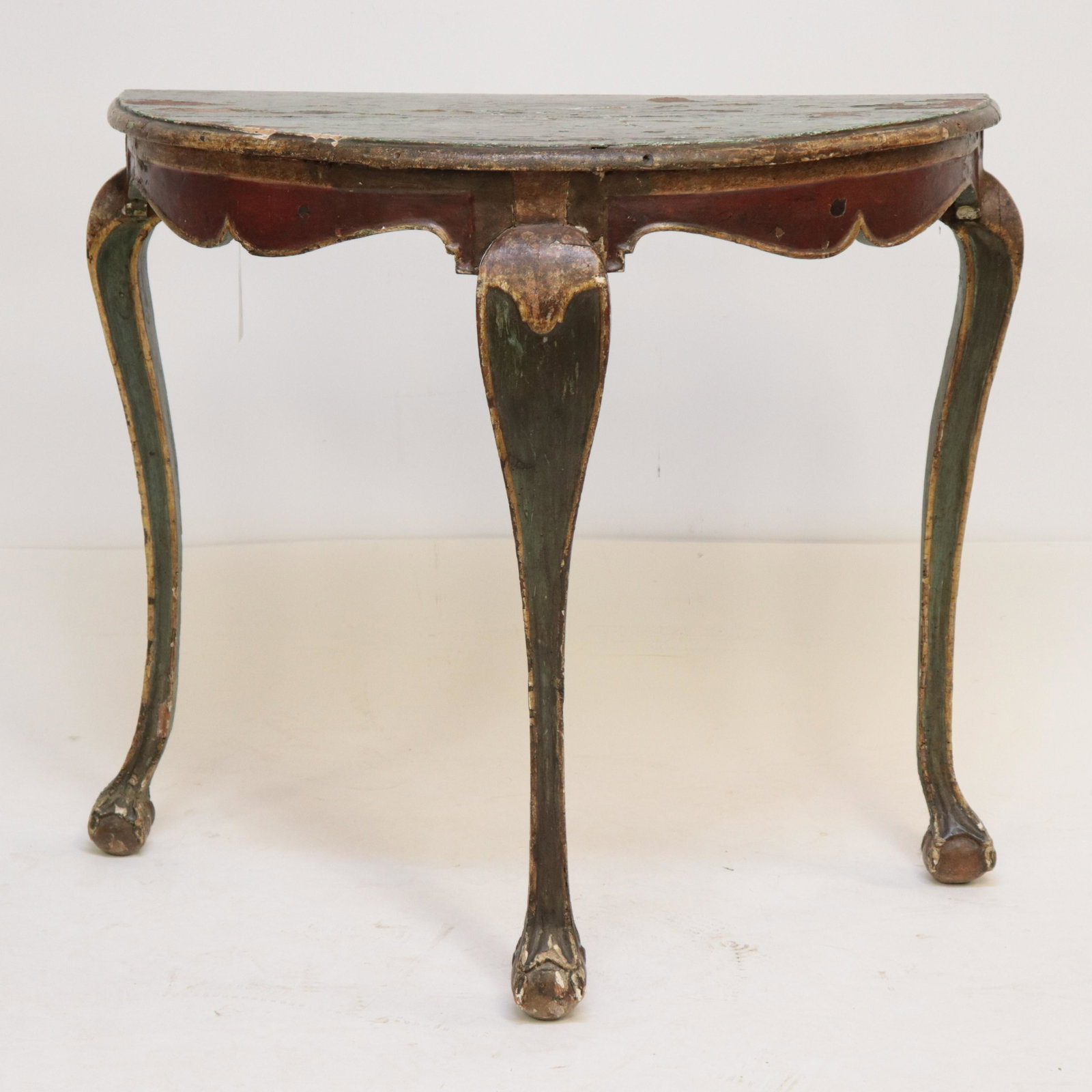 Italian Rococo Console Table, Mid 18th C.: Italian Rococo Paint and Gilt Wood Demi Lune Italian Rococo Painted Console Table, Mid 18th C., cabriole leg with claw and ball foot Provenance:https://www.bonhams.com/auctions/24069/lot/233/?category