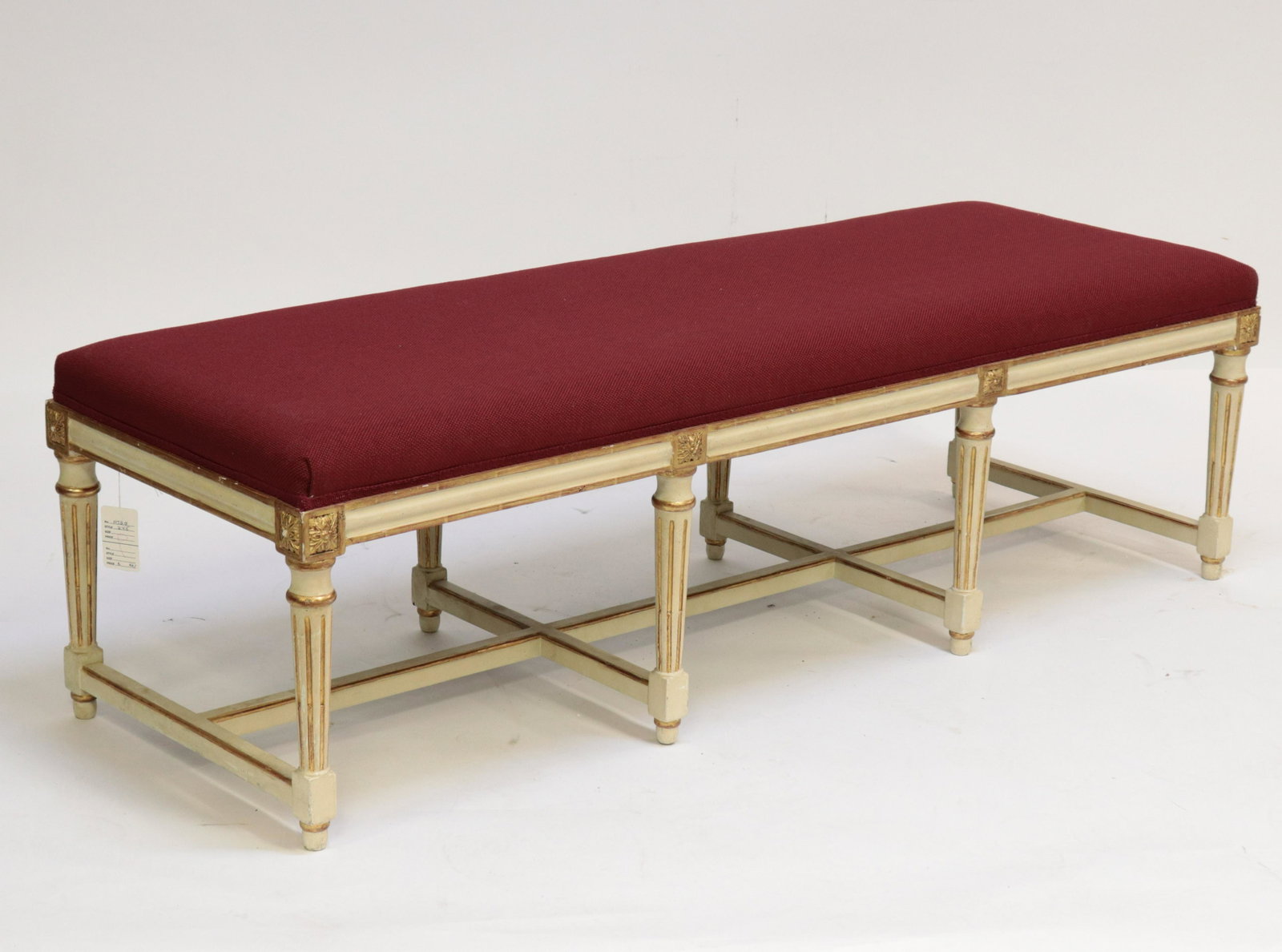 Louis XVI Style Parcel Gilt & Painted Banquette: Louis XVI Style Parcel Gilt & Cream Color Painted Banquette Dimensions: 17" H x 60" W Property from a New Jersey collection (NJBO245)(MS)