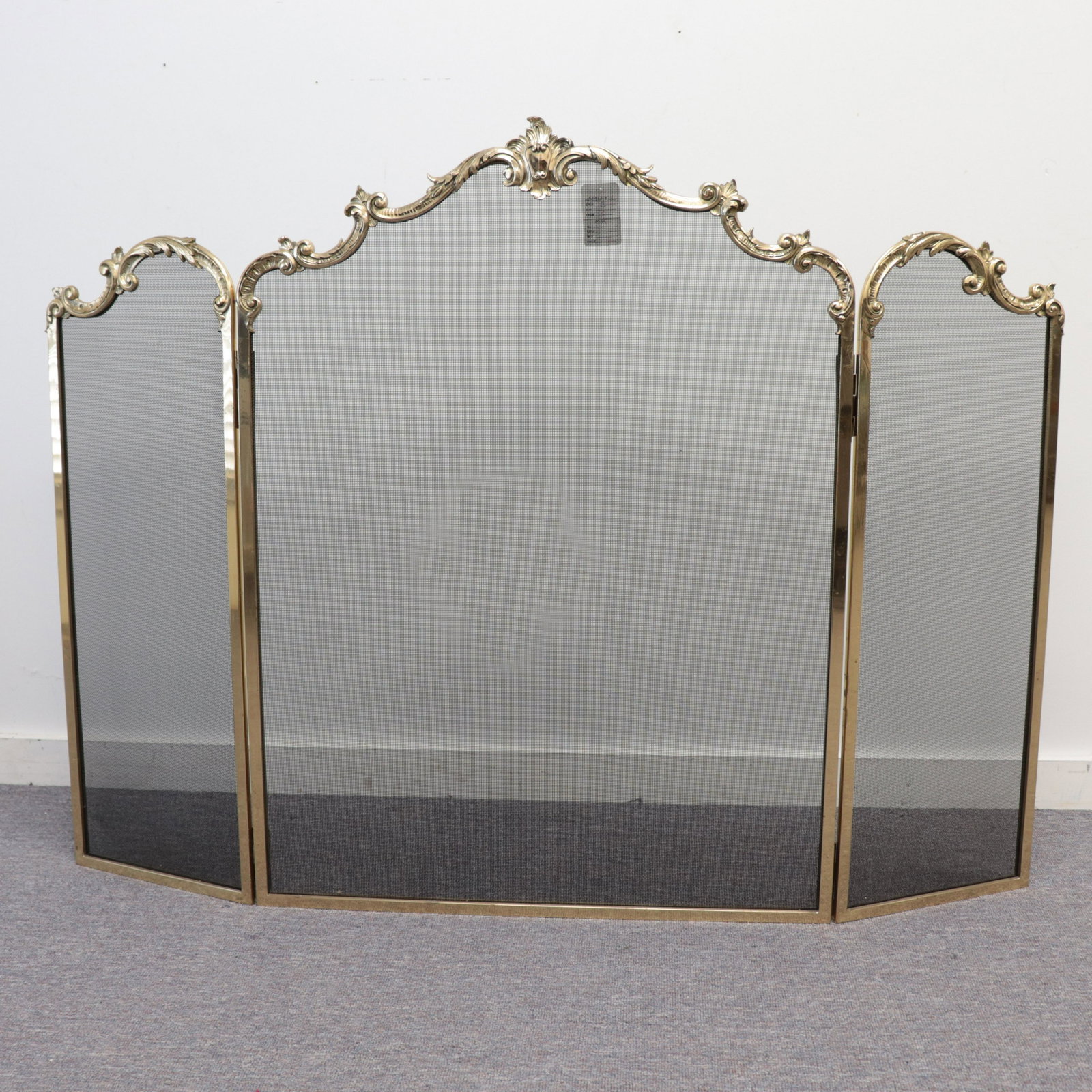 William H. Jackson Co., Rococo Style Firescreen: Rococo Style Brass and Metal Fire Screen, 20th C., 3 part folding Dimensions: 39 1/2 x 54 Property from the former home of Joan Rivers (NMILF7121)(MM)