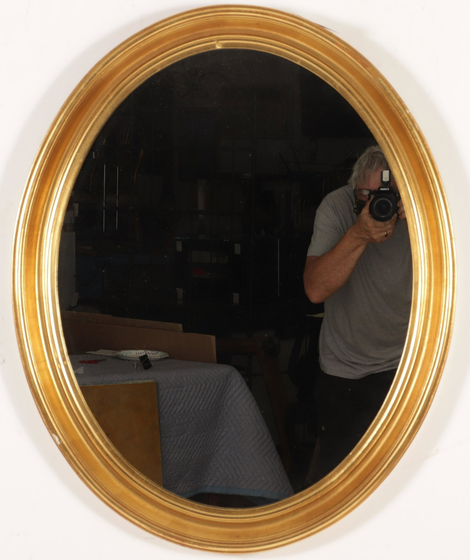 Gilt Wood Oval Mirror, 20th C.: Gilt Wood Oval Mirror, 20th C., Dimensions: 33 x 27 x 2 Property from a West Hartford, CT collection (MALM7626)(MM)