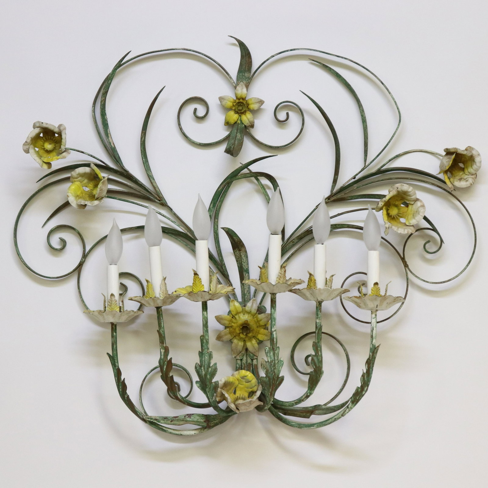 Italian Tole Metal Floral Sconce: Italian Tole Painted Floral Motif Metal Electrified Wall Sconce, 6 lights Dimensions: 28 x 38 Property from the former home of Joan Rivers (NMILF7122)(MM)