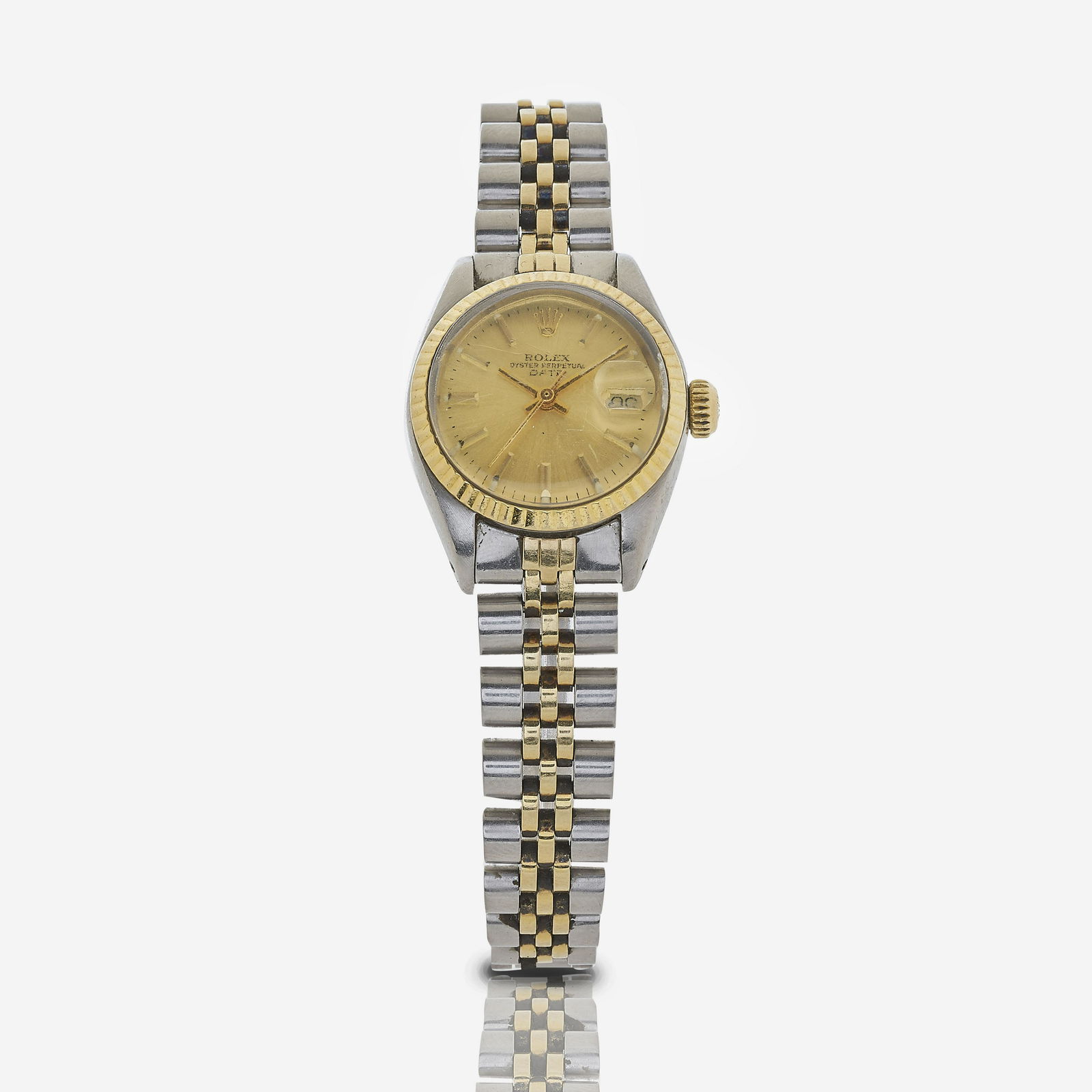 Ladies Rolex Oyster Perpetual Date, c 1978: Rolex round 26mm case Oyster Perpetual Date wrist watch, stainless steel and 18k gold, two tone jubilee bracelet (62523D14). Champagne dial, luminous hour markers and hands, date aperture under Cyclop