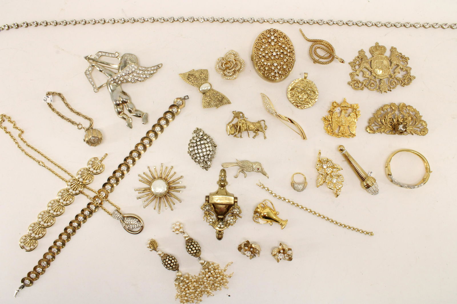 Large Group of Gold Tone Costume Jewelry: Designers include Miriam Haskall, Christian Dior, BSK, Trifari, Hobe, Swarovski, etc Dimensions: Various Property from a Roxbury, CT residence (JLOM8234/LOT)(EL)