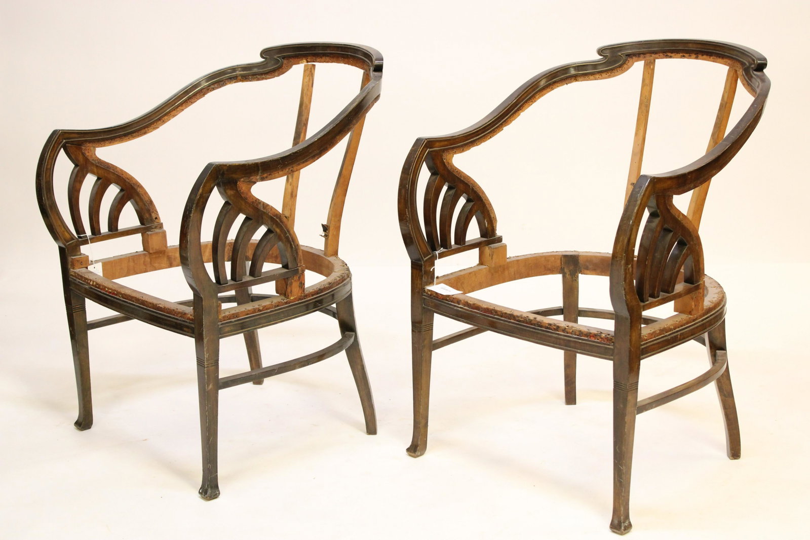 Pair English Art Nouveau Stained Birch Armchairs: Pair English Art Nouveau Stained Birch Armchairs Dimensions: 35" H x 24 3/4" W x 25 1/2" D Property from the Estate of an Important New York Modernism Dealer. (NJWA423/2)(MS)