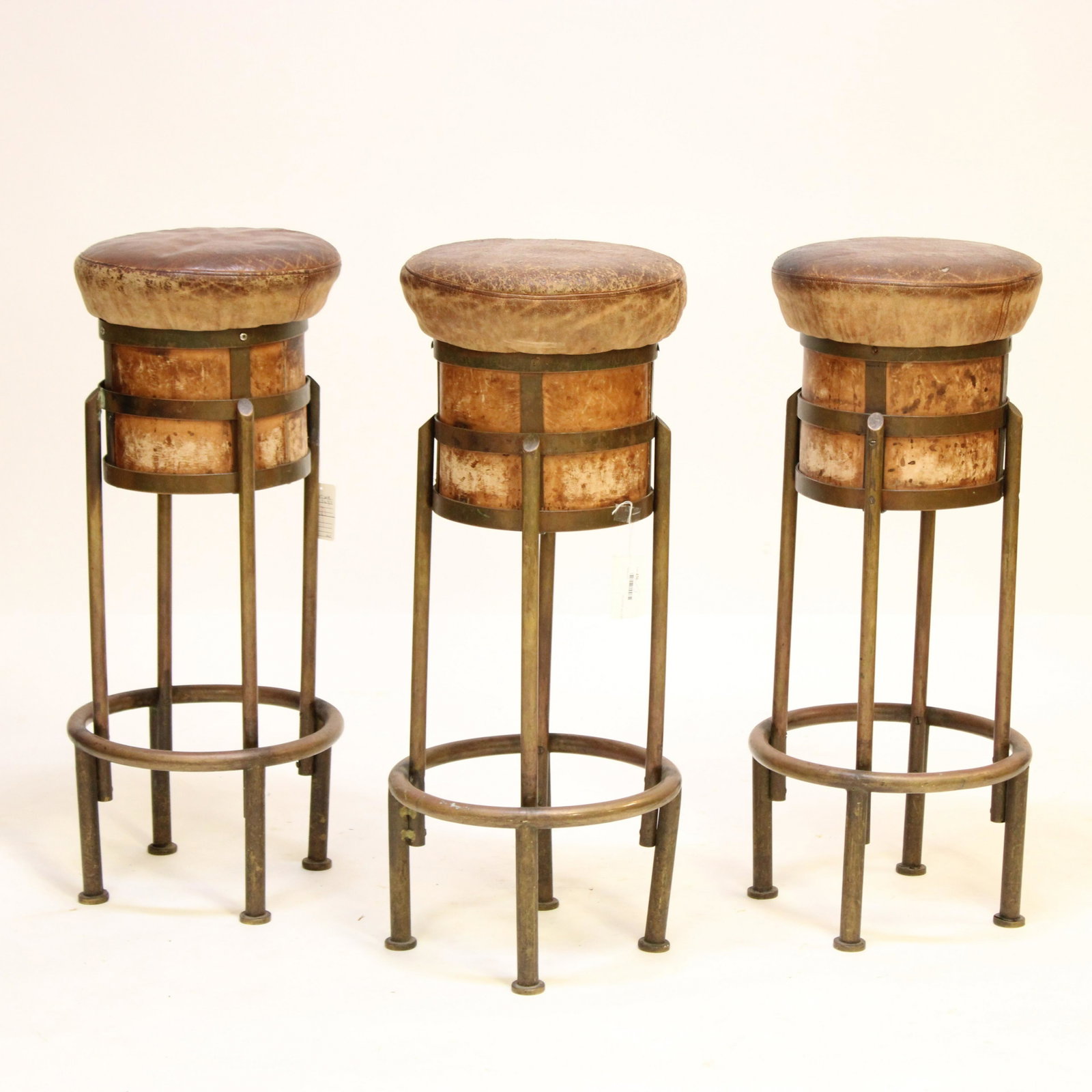 3 Art Deco Copper & Leather "Mushroom" Stools: Set of 3 Art Deco Copper "Mushroom" Bar Stools, upholstered in brown worn & crackled leather Dimensions: 33 1/2" H x 13" Dia. Property from the Estate of an Important New York Modernism Dealer. (NJWA5