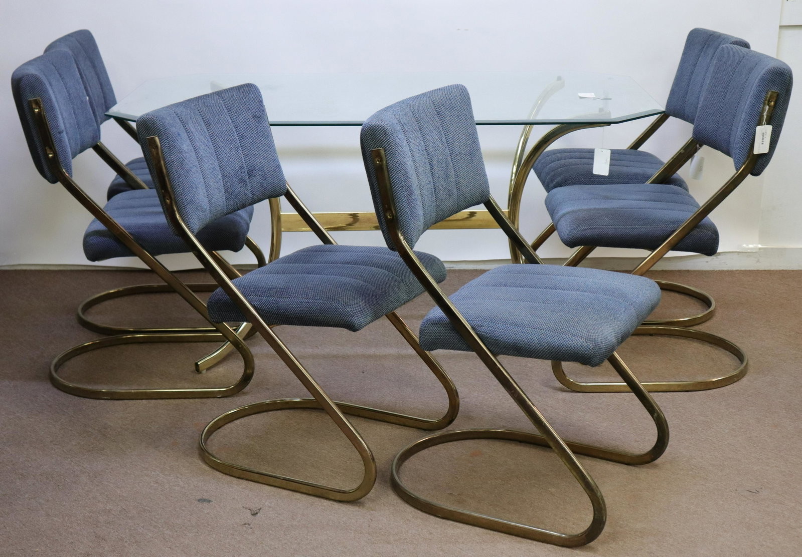 Italian 70's Brass Dining Table & 6 Chairs: Italian 70's Brass Dining Table & 6 Chairs Dimensions: Chairs: 35 1/2" H x 18 3/4" W x 25" D. Dining Table 29 1/4" H x 36" W x 60" L Property from a West Hartford, CT collection (MORT687/7)(MS)