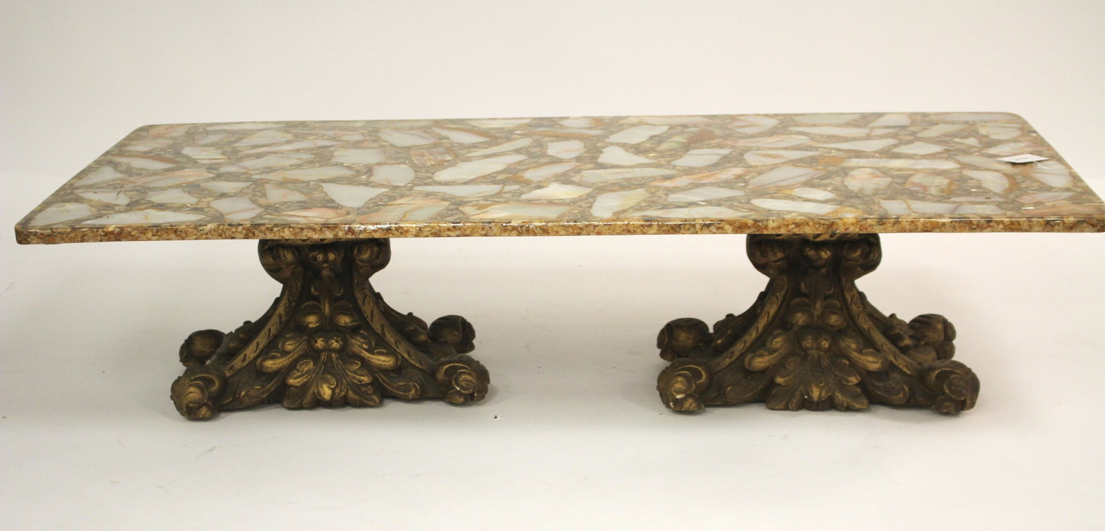 Rococo Style Gilt Composition Coffee Table: Rococo Style Gilt Composition Coffee Table, with orange abalone and resin in top Dimensions: 18 1/2" H x 60" W x 30 D Property from the Estate of an Important New York Modernism Dealer. (NJWA170)(MS)