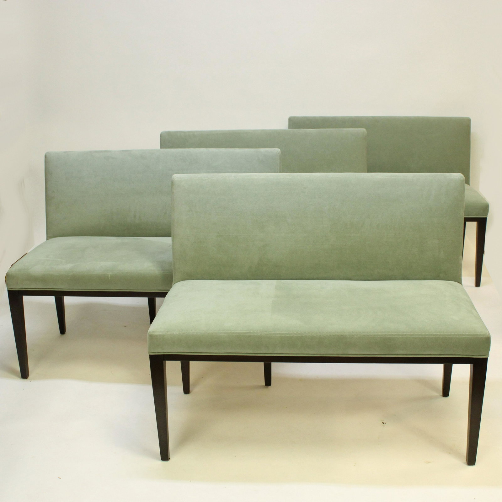Modern Swaim Dining Seating Pieces: 6 pieces includes 4 benches and 2 chairs in a light green suede, with metal chair pulls to back side Dimensions: Bench 32 x 24 x 40 and chair 32 x 22 x 22 Property from a Kent, Connecticut home (MDAR9