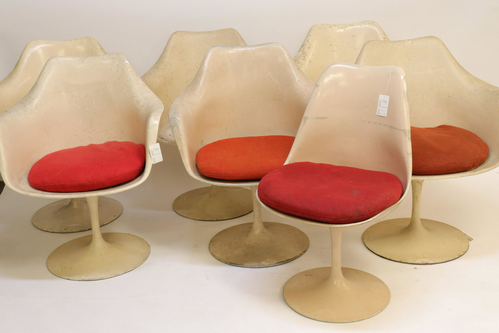 13 Eero Saarinen for Knoll Fiberglass Swivel Chair: Set of 13 Eero Saarinen for Knoll Fiberglass Swivel Armchairs, together with a style side chair, circa 1960 Dimensions: 32" H x 26" W x 24" W Property from a Park Slope Estate (DOLE599/14)(MS)