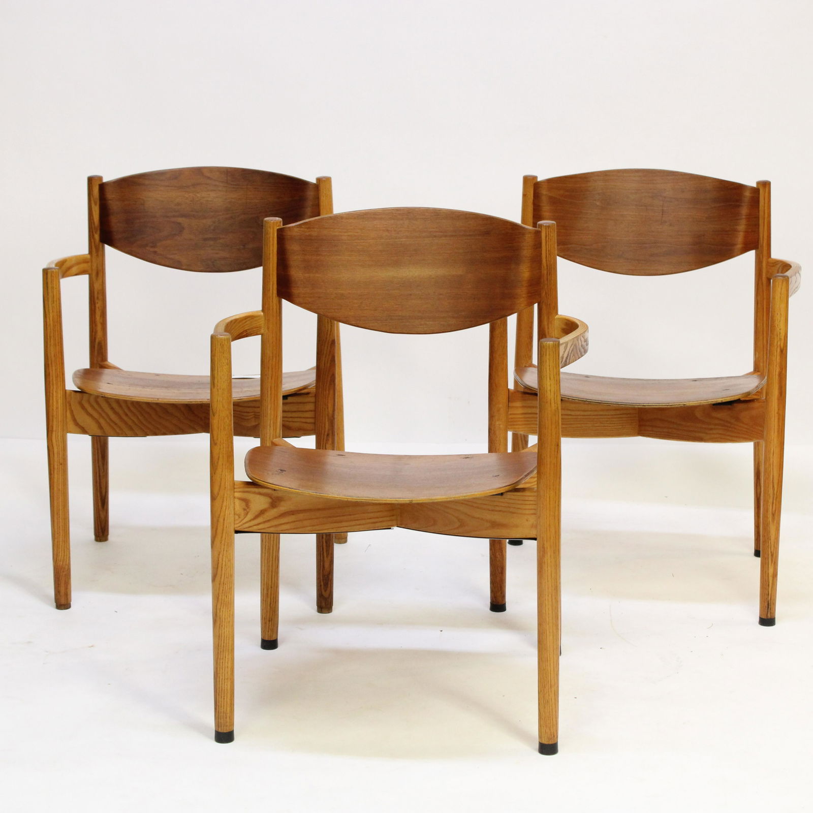 3 Jens Risom Wooden Armchairs: base marked with manufacturers label Dimensions: 32 x 25 x 22 Property from the collection of a Massachusetts professor. (STES9727/3)(MM)