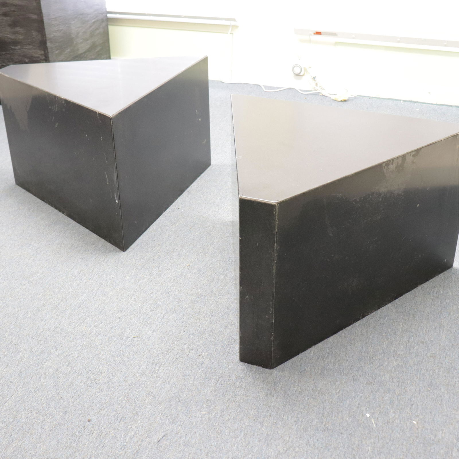 Pair of Triangular Granite Side Tables: Pair of Granite Squared Triangular Form Side Tables, one side is squared Dimensions: 20 x 29 x 32 1/2 Property from a Roxbury, CT residence (JLOM7681/2)(MM)