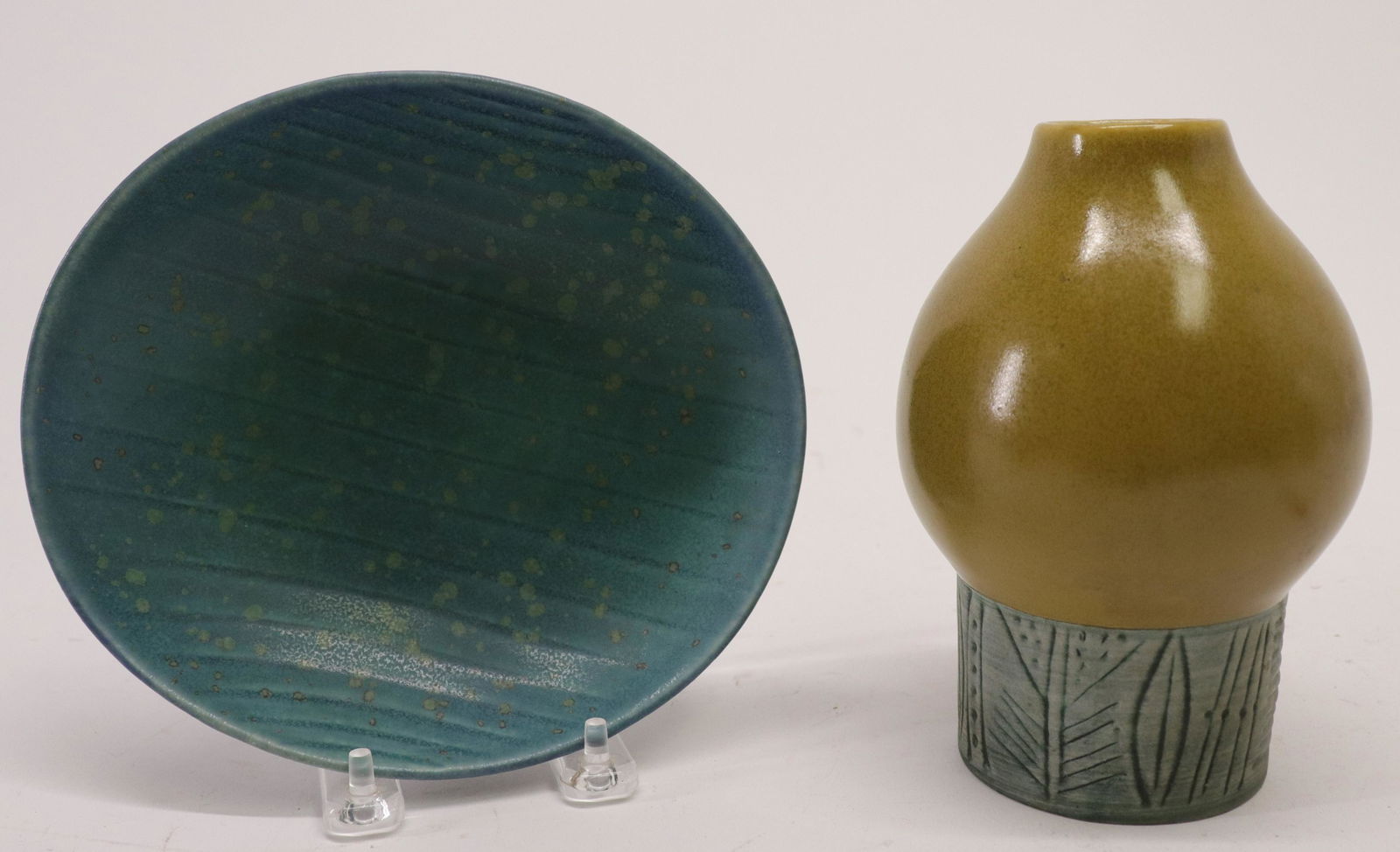Stalhane Green Ceramic Bowl, Rorstrand & Vase: Carl-Harry Stalhane Green Ceramic Bowl, Rorstrand, signed with monogram, and Lisa Larsen ceramic vase, Gustavsberg Sweden Dimensions: 2 1/4" H x 6 1/2" x 7 1/2" and 6 3/4" H Property from the collecti
