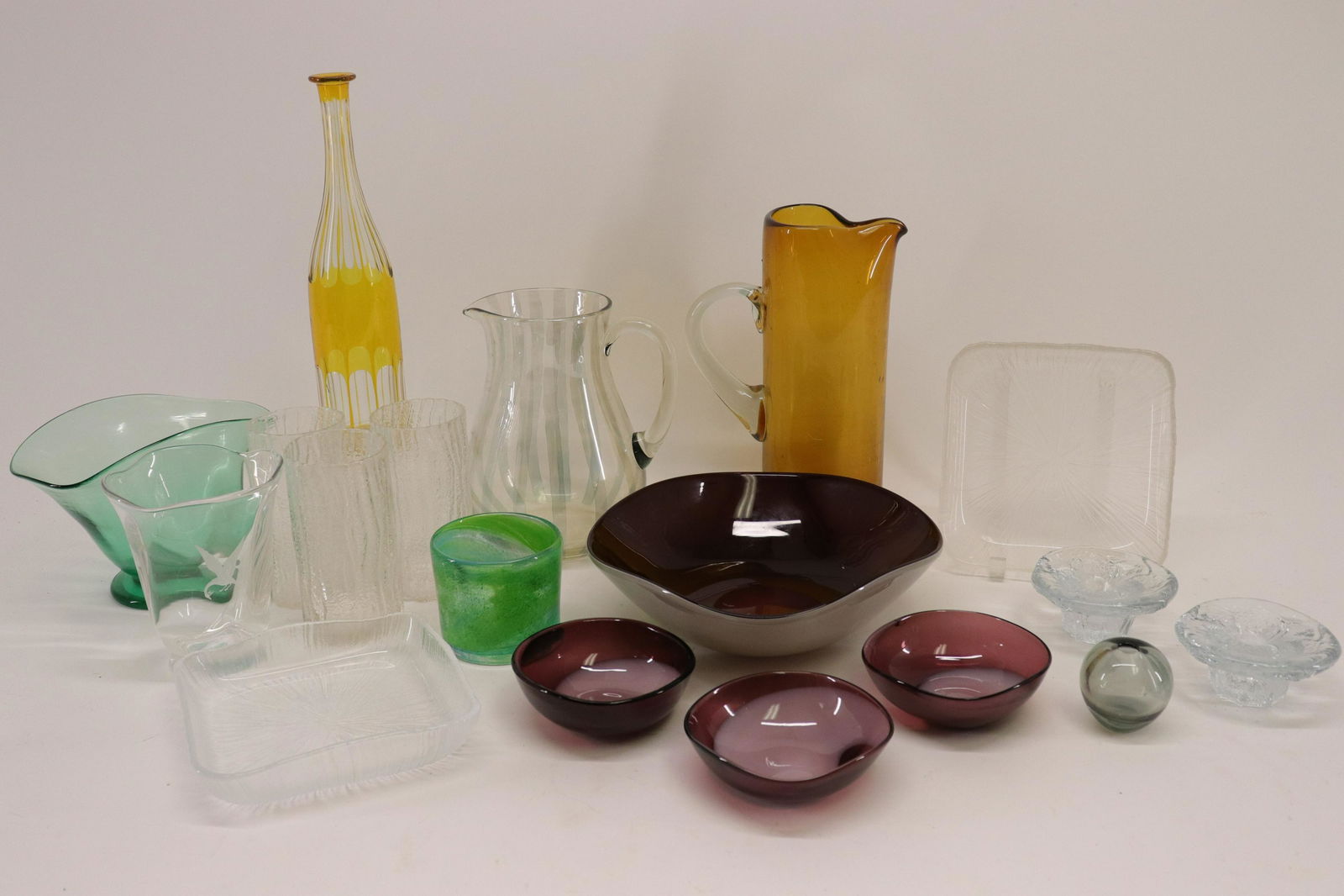 Scandinavian Art Glass, Orup, Holmegaard: Group of Mostly Scandinavian Art Glass, includes smoky glass bud vase by Holmegaard , green vase by Beng Orup for Johansfors, Peacock etched vase in descriptly etched along base, various unmarked tall
