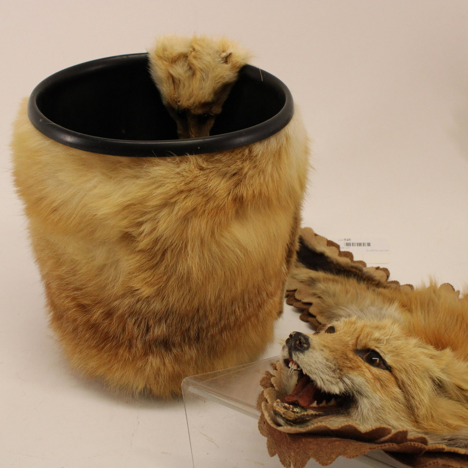 Red Fox Rug & Fox Waste Basket: Red Fox Rug & Fox Covered Waste Basket, glass eyes, felt & cloth backing Dimensions: 44" x 30" and 10 1/2" H x 9 1/2" dia. Property from the Litchfield Estate of Tracy H. Griswold (TGLI8545/2)(WT)