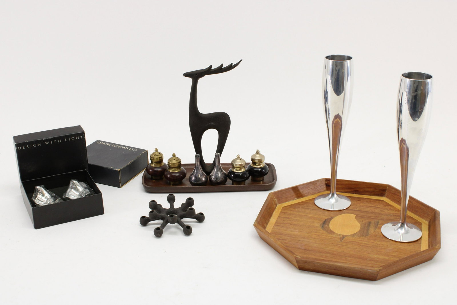 Scandinavian/Jap Mid Century Modern Tabletop Items: Scandinavian and Japanese Mid Century Modern Tabletop wares, includes 2 Nambe champagne flutes, 3 Dansk candle holders includes 2 sets and one single 12 light piece. 4 metal and wooden salt and pepper